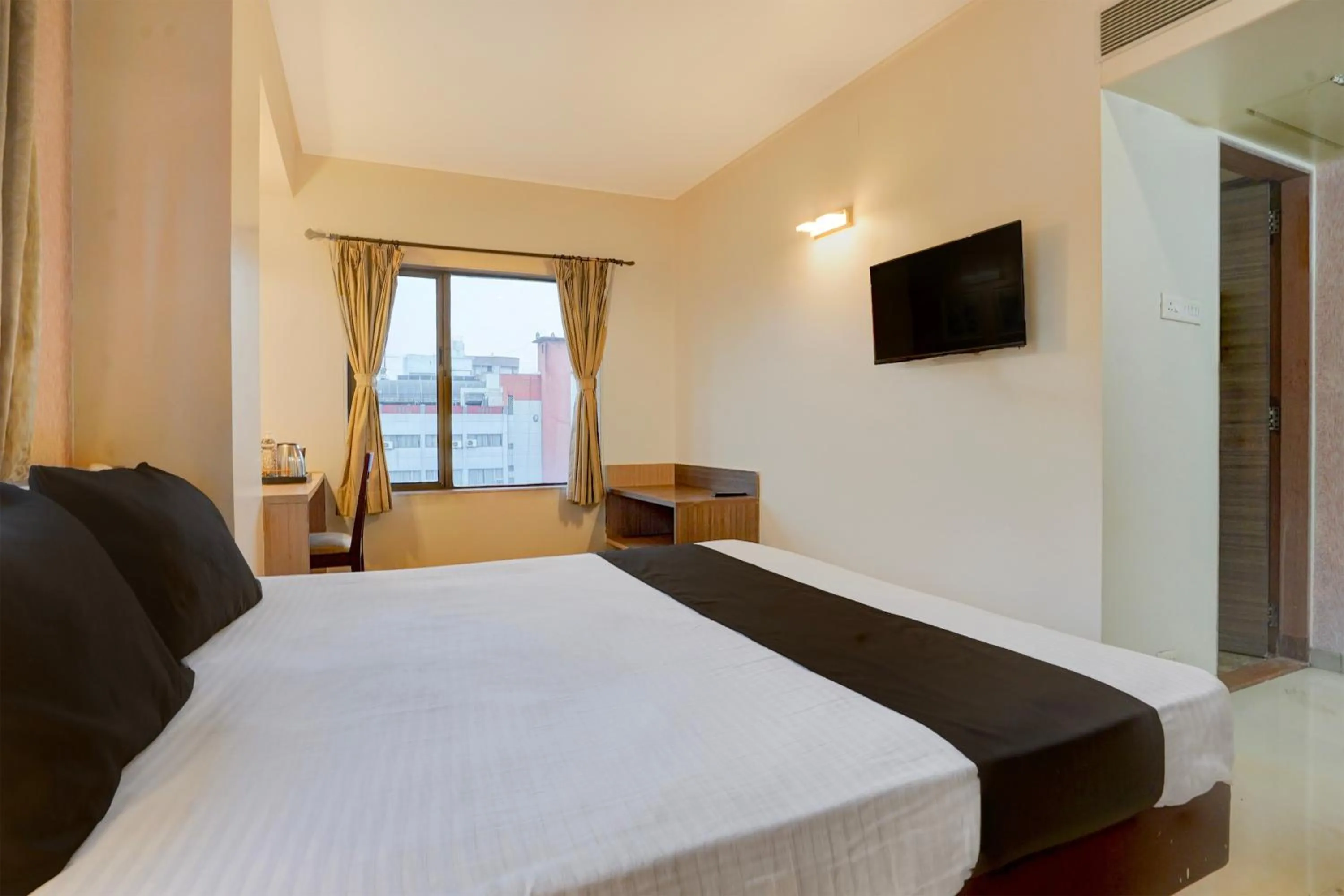 Bedroom, Bed in Townhouse Oak Pune Railway Station Formerly Kapil Residency