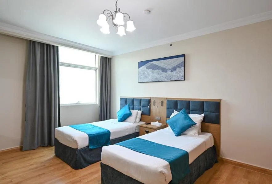 Bed in Saray Musheireb Hotel Suites and Apartment
