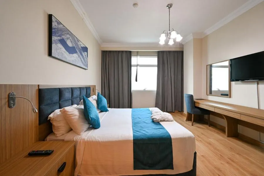 Bed in Saray Musheireb Hotel Suites and Apartment