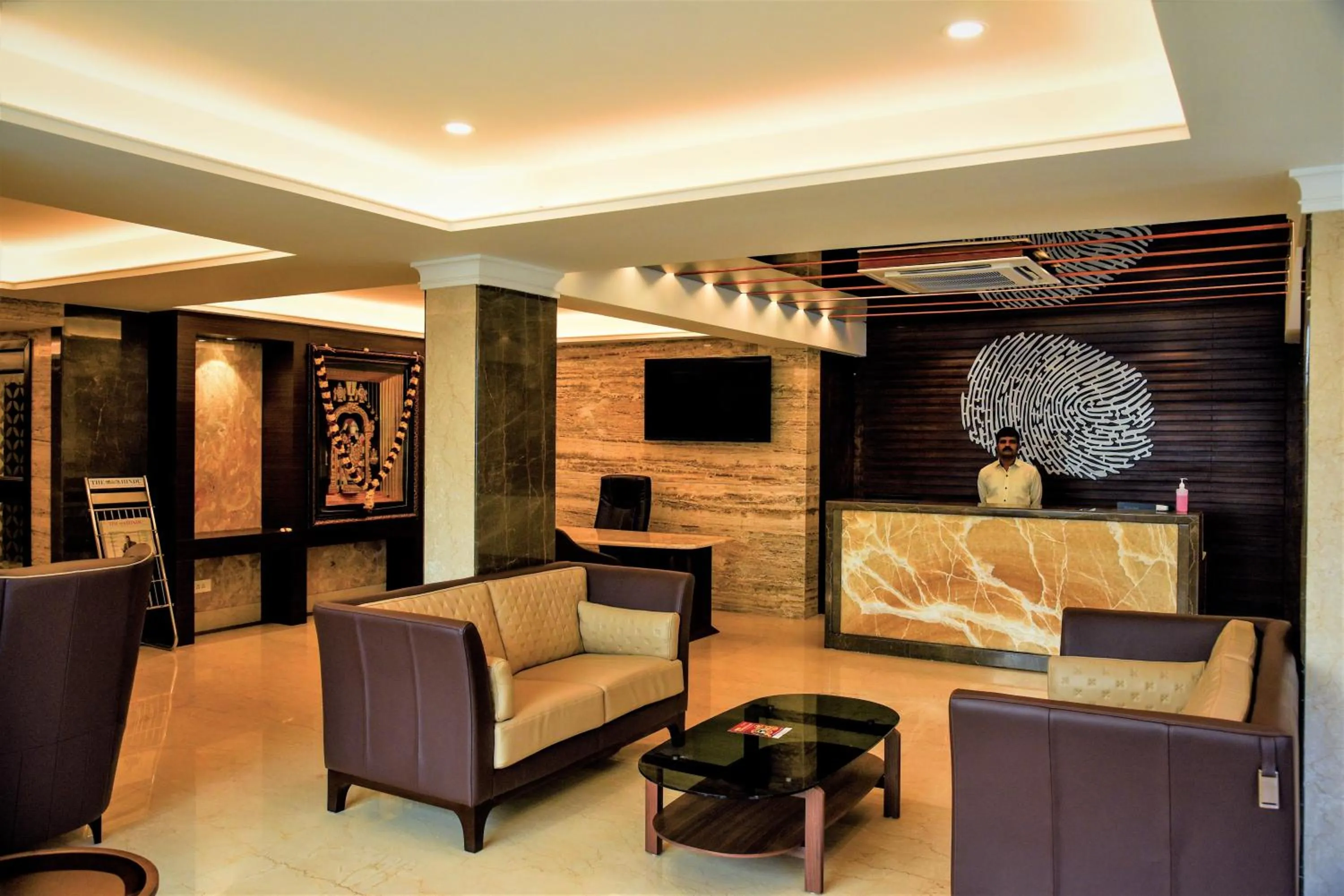 Communal lounge/ TV room in The Saibaba Hotel