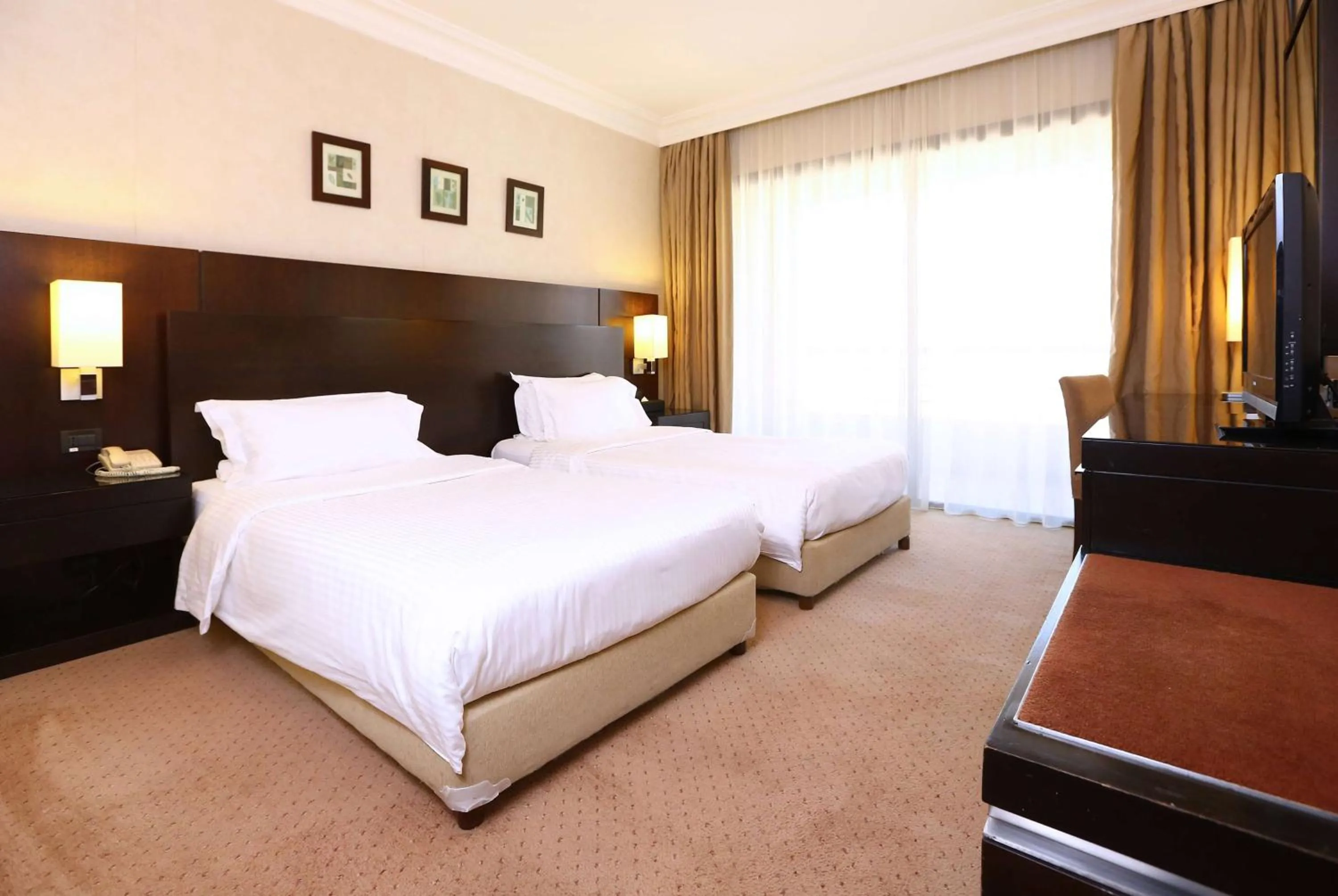 Photo of the whole room, Bed in Ramada Plaza by Wyndham Beirut Raouche