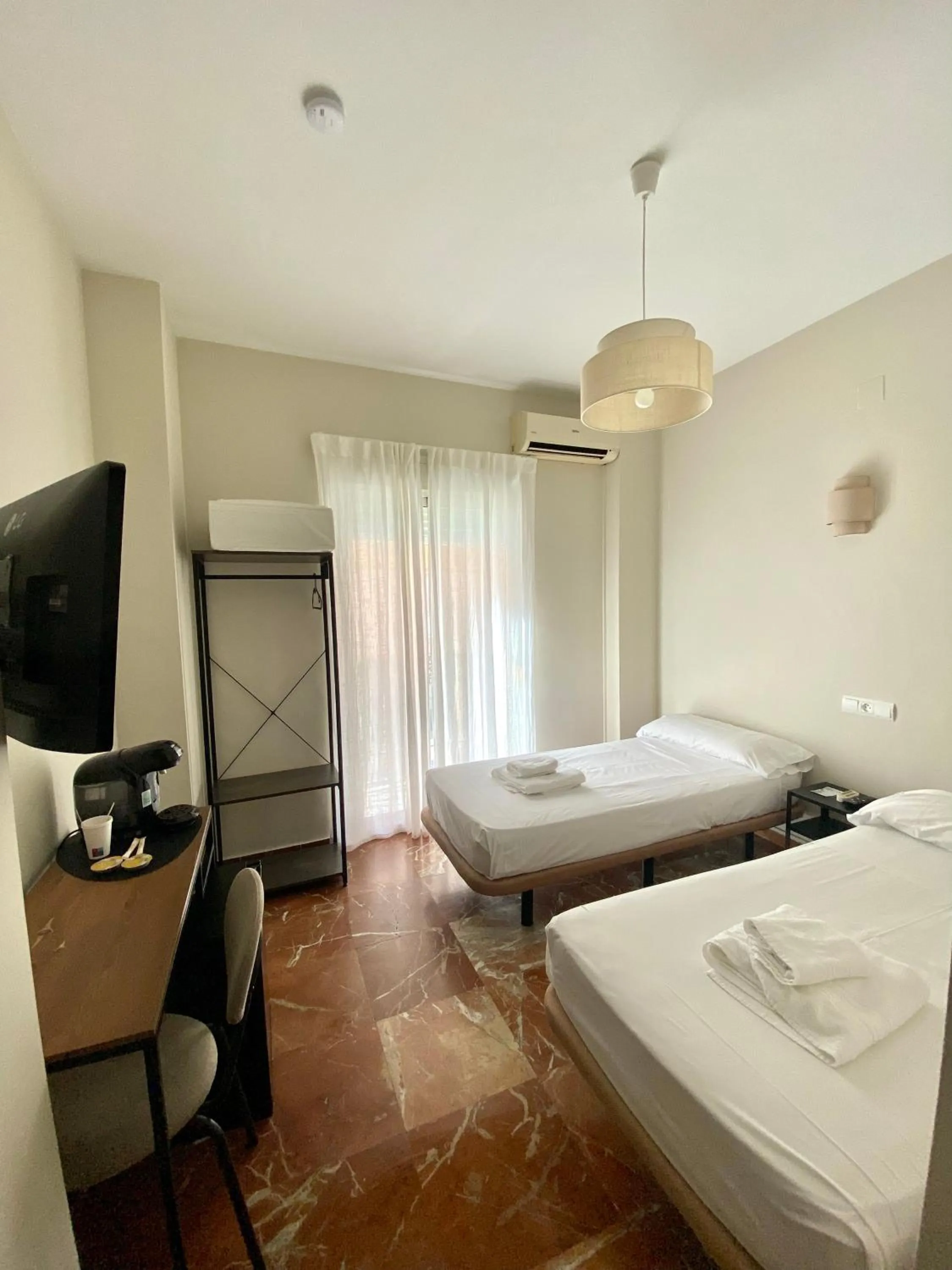 Bed in La Vega Rooms