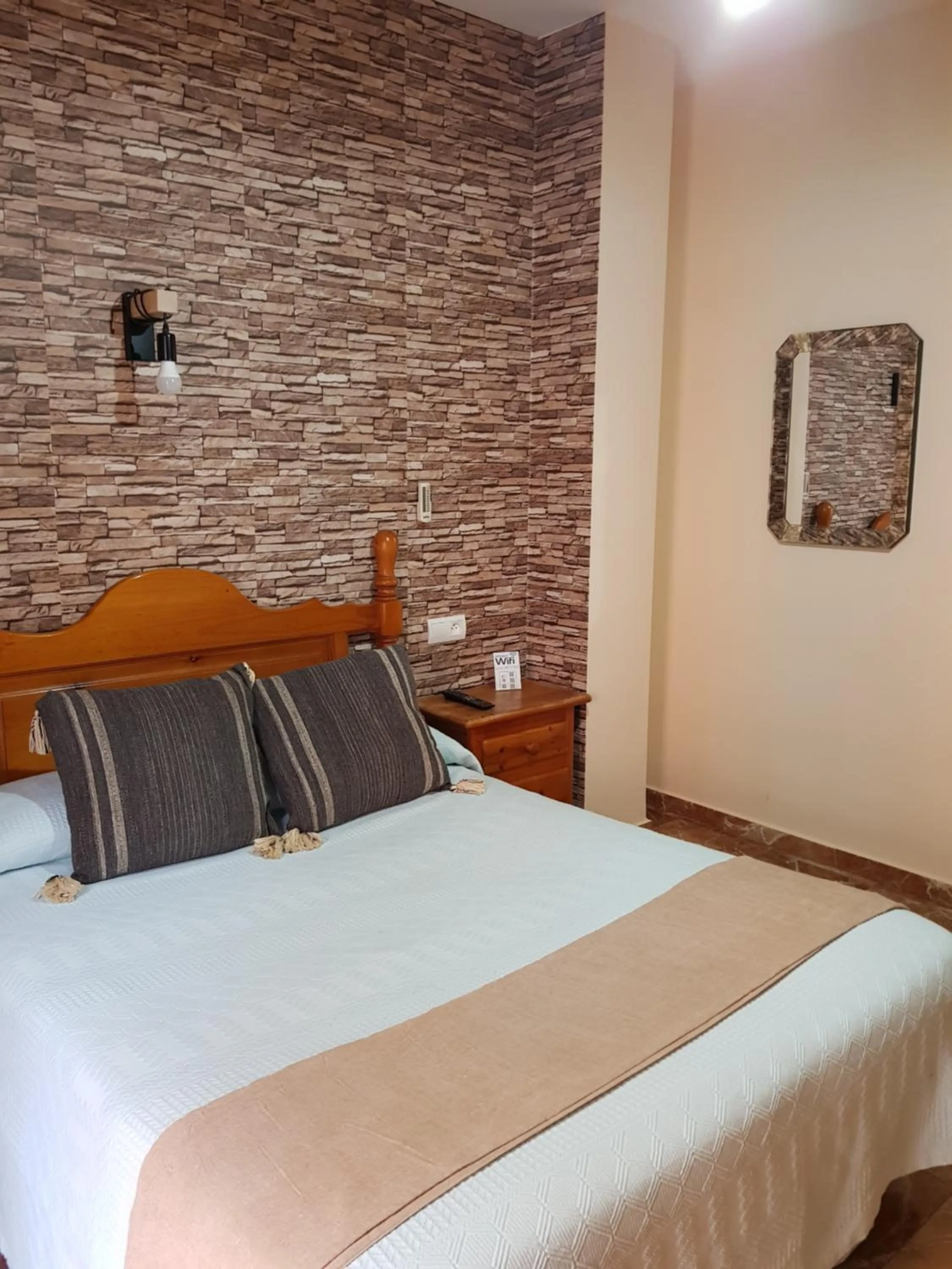 Bathroom, Bed in Pension La Vega