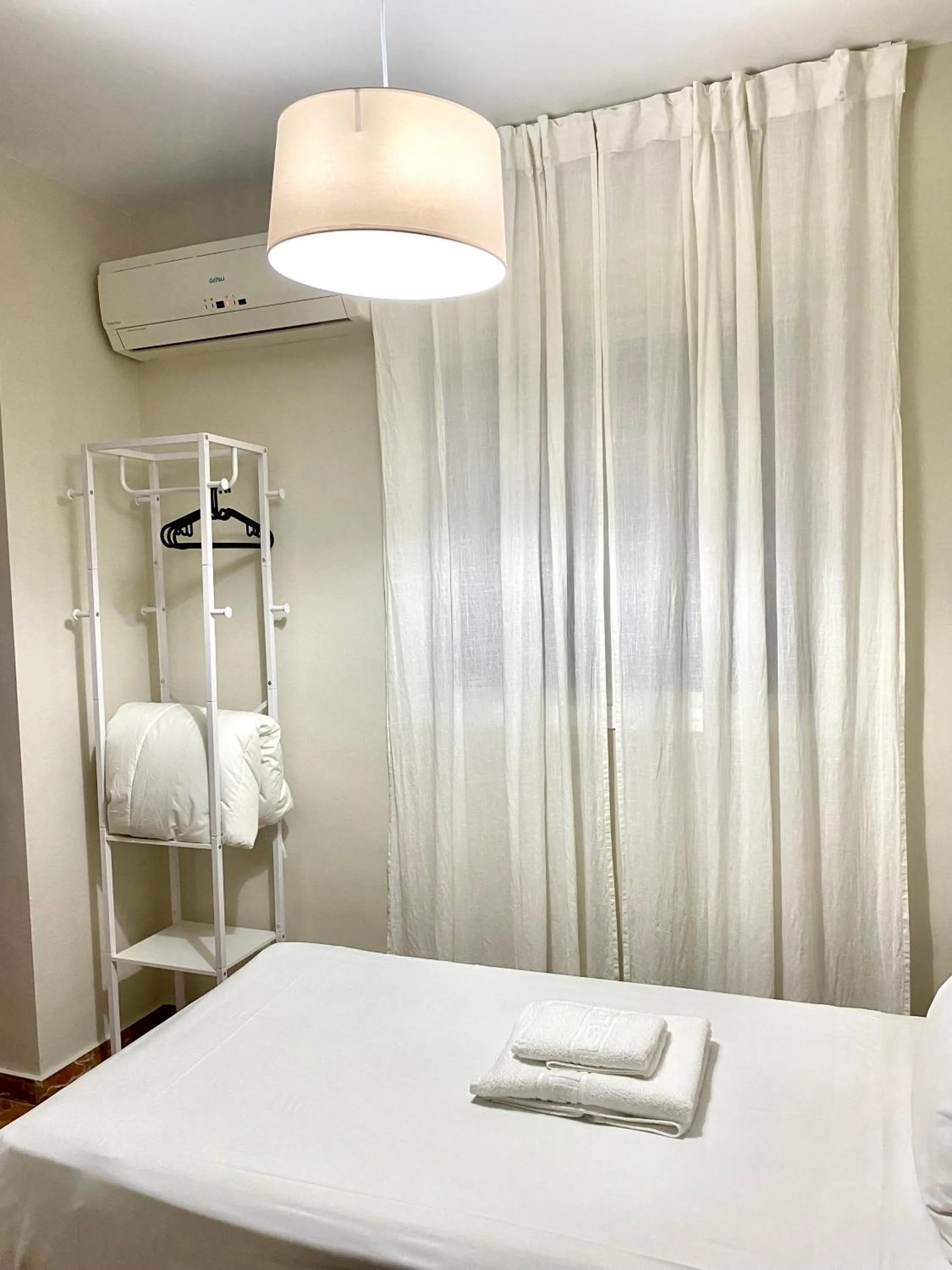 Bed in La Vega Rooms