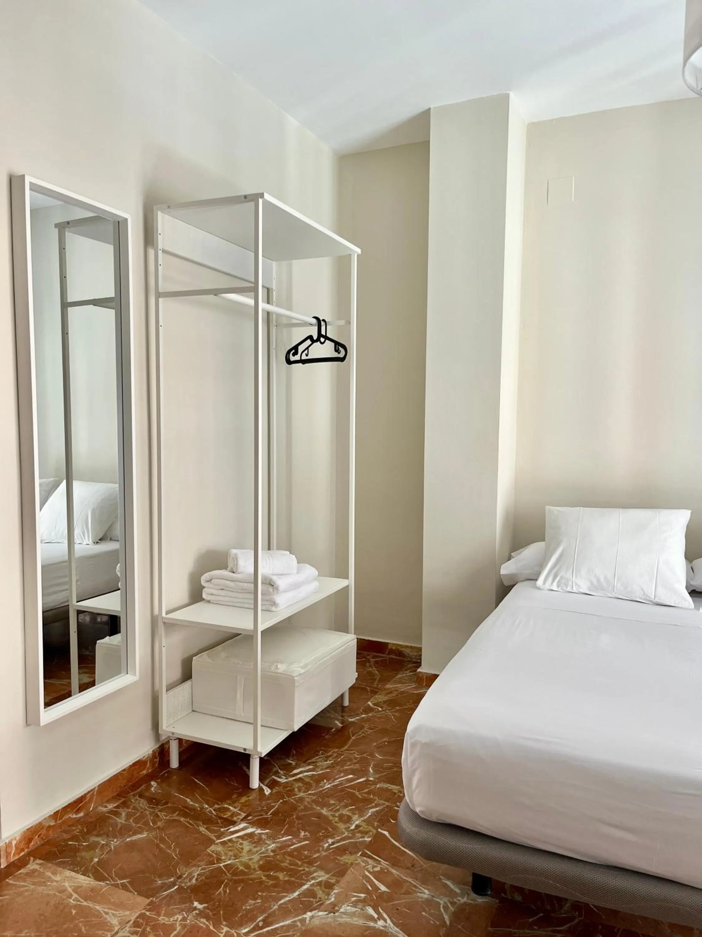 Bed in La Vega Rooms