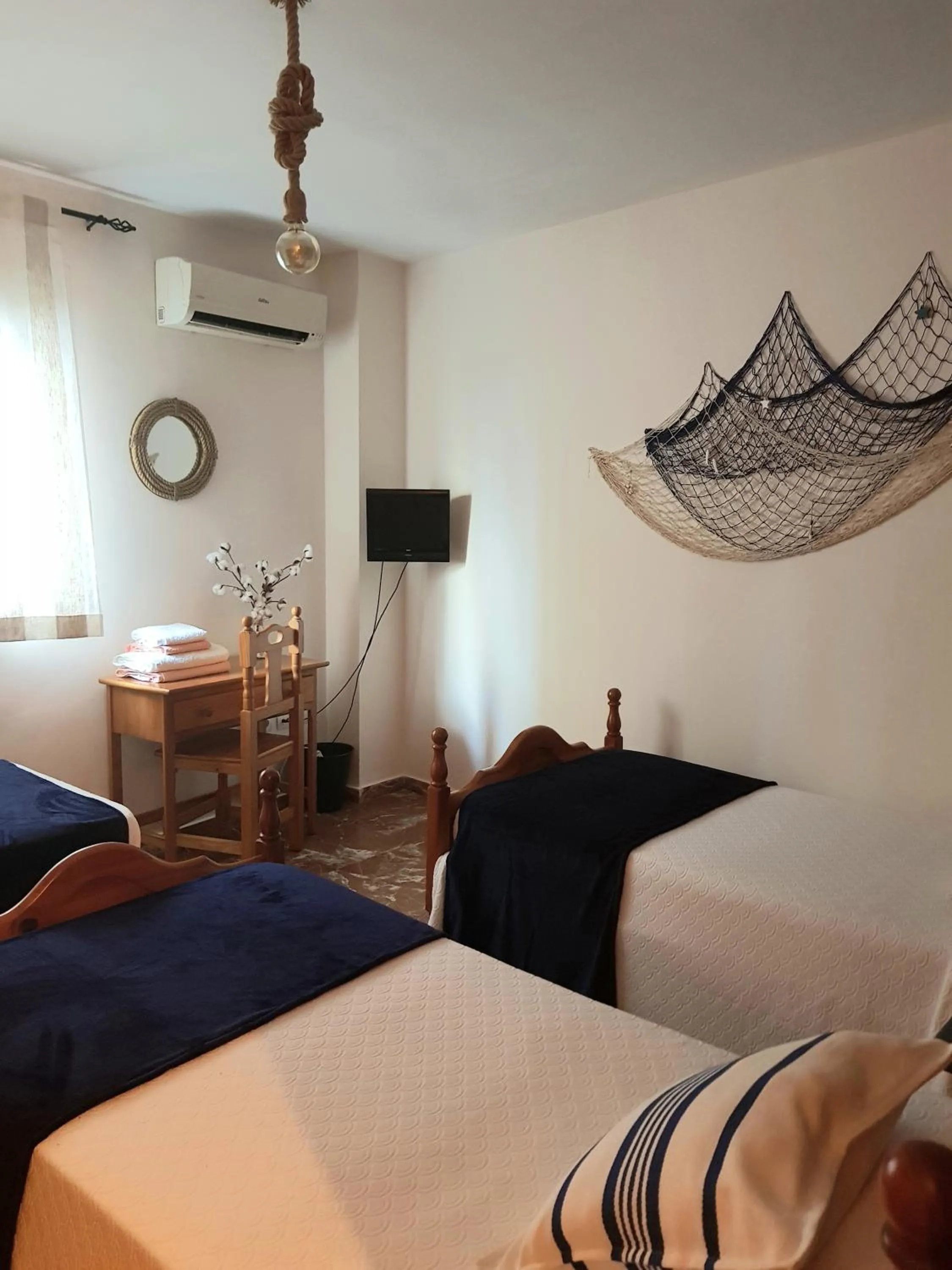 Bathroom, Bed in Pension La Vega