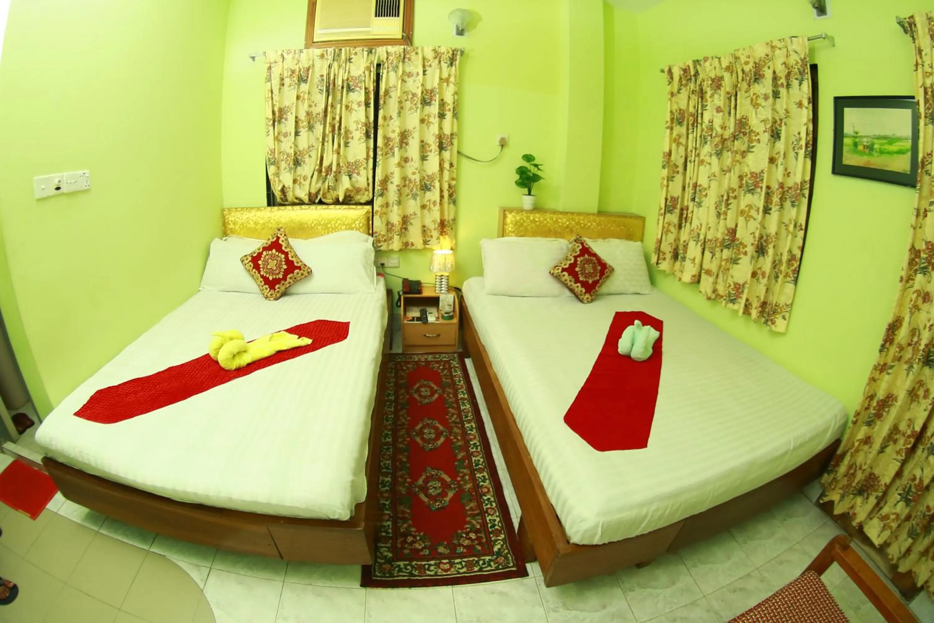 Bed in Hotel Farmis Garden