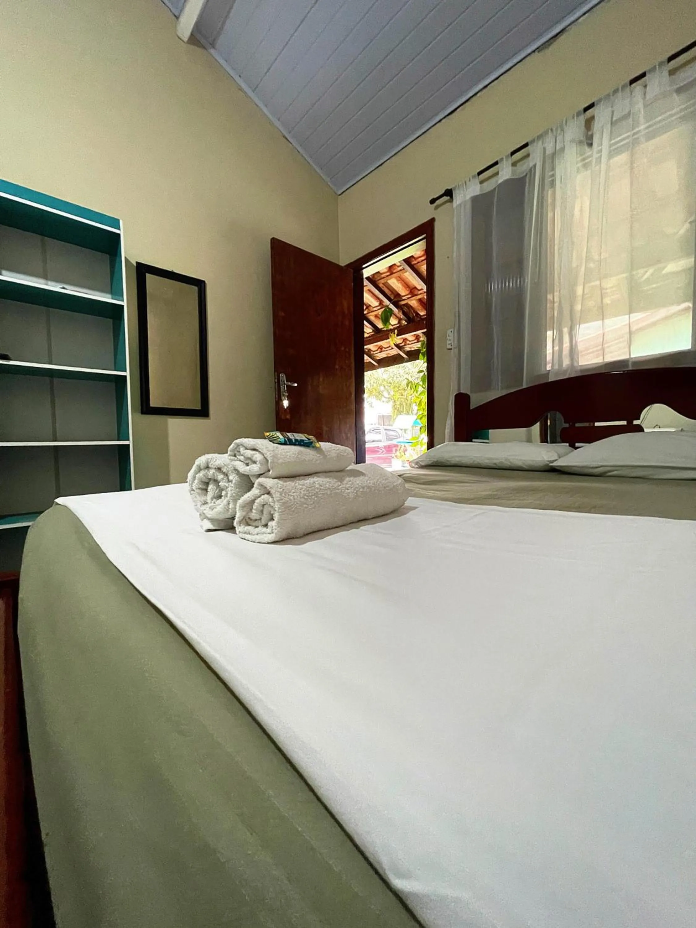 Bed in Pousada Chalé do Beija Flor