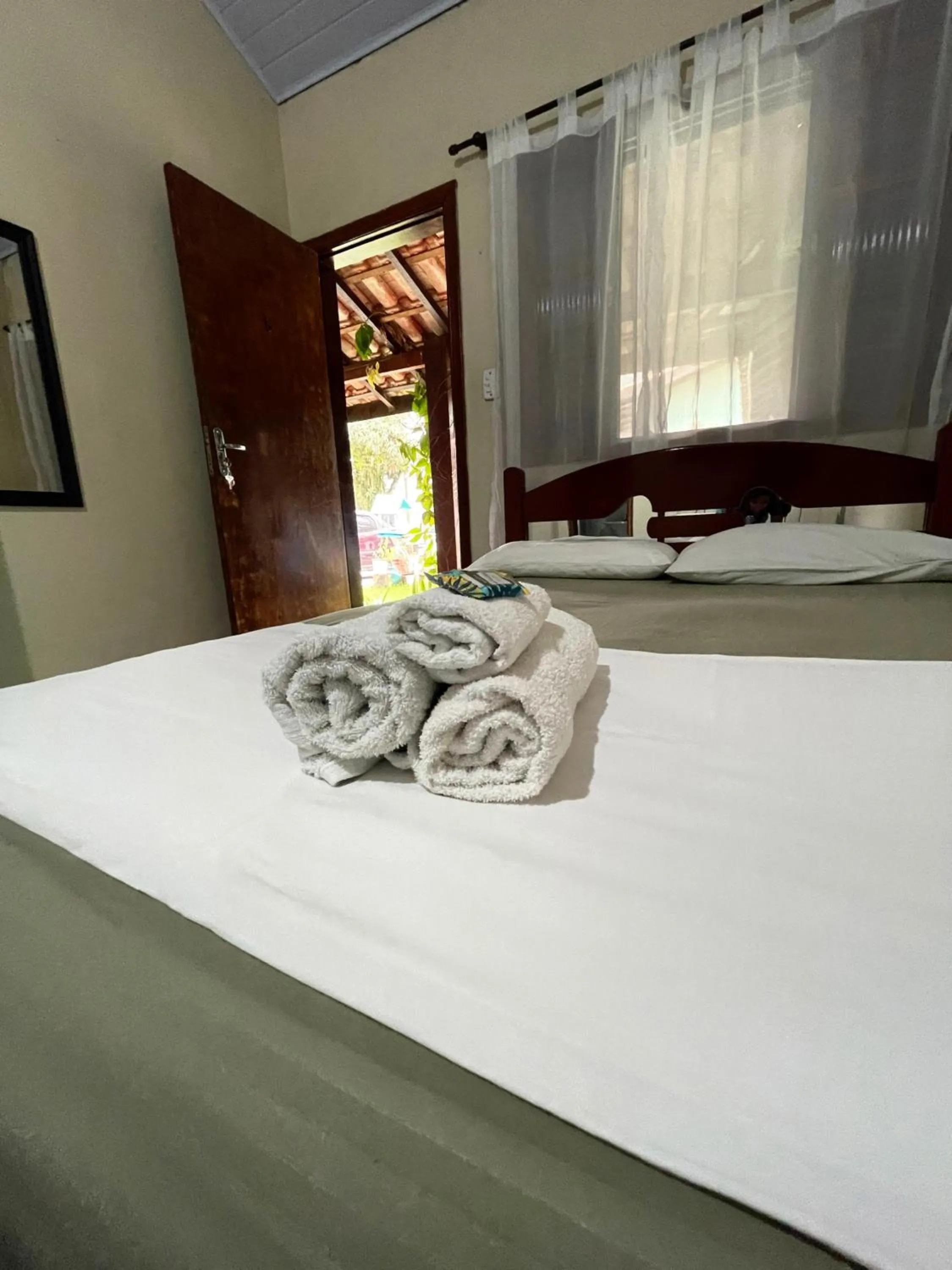 Bed in Pousada Chalé do Beija Flor