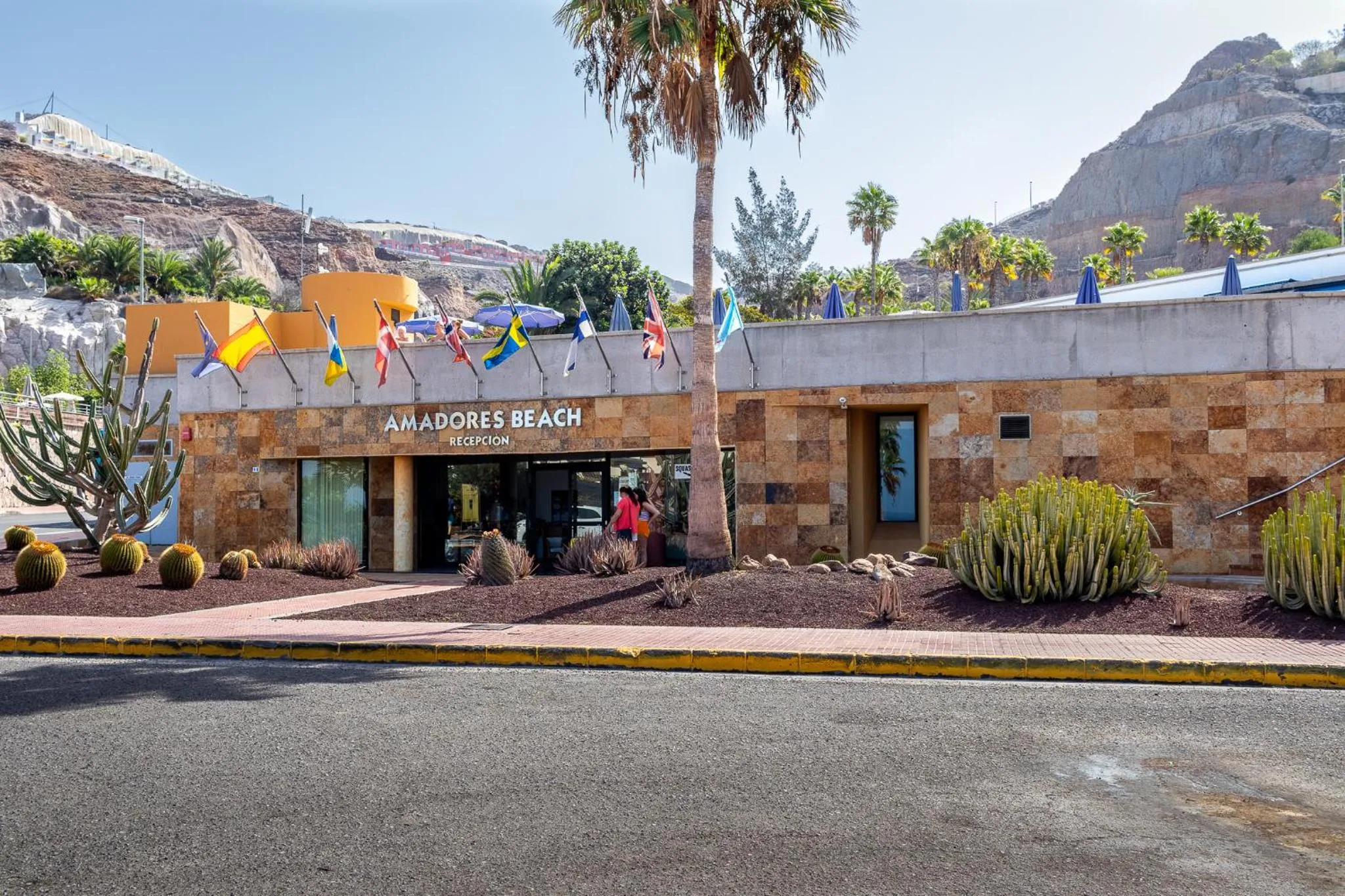 Property logo or sign in Amadores Beach Apartments