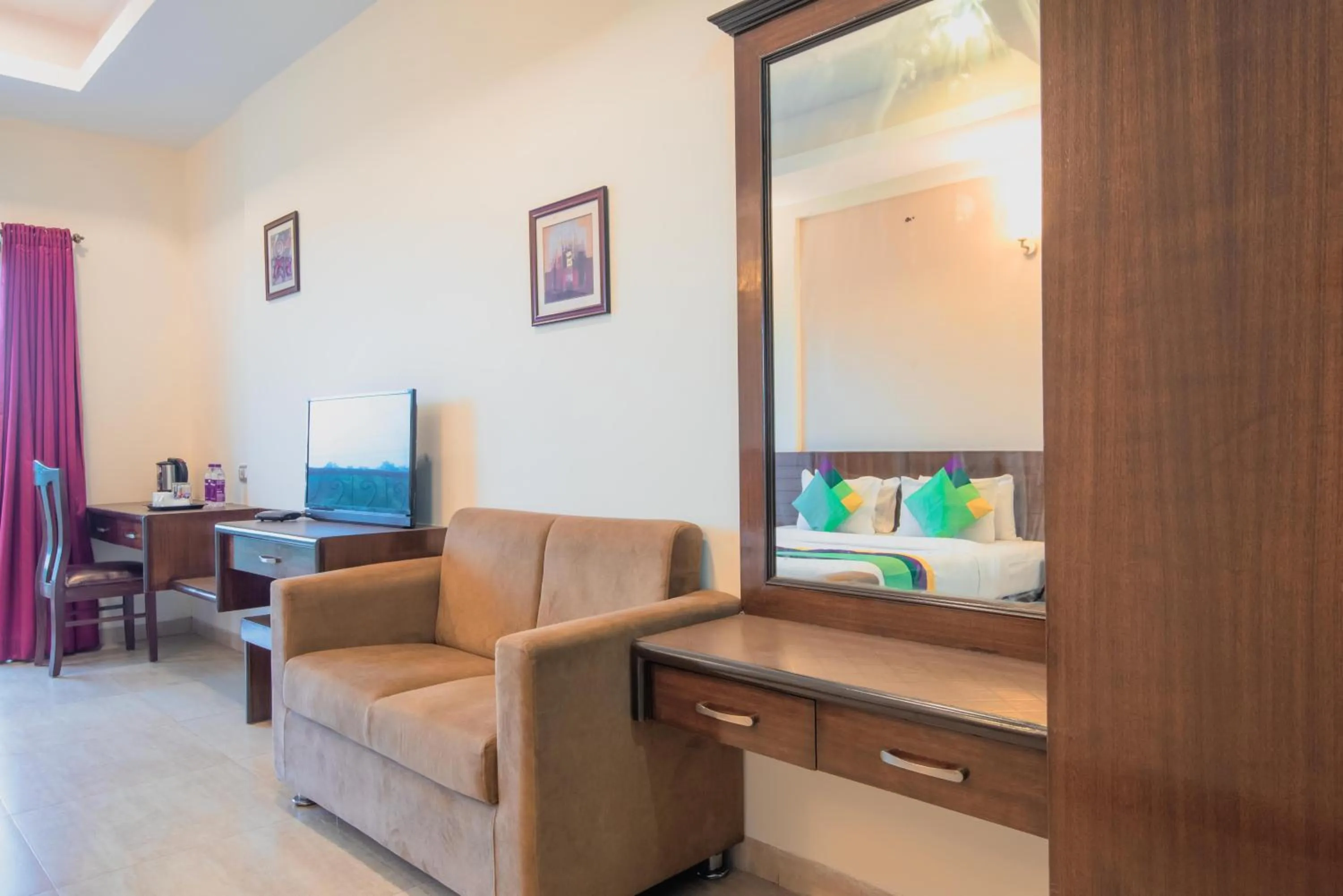 Bedroom in Treebo Reveniir Resort with Pool