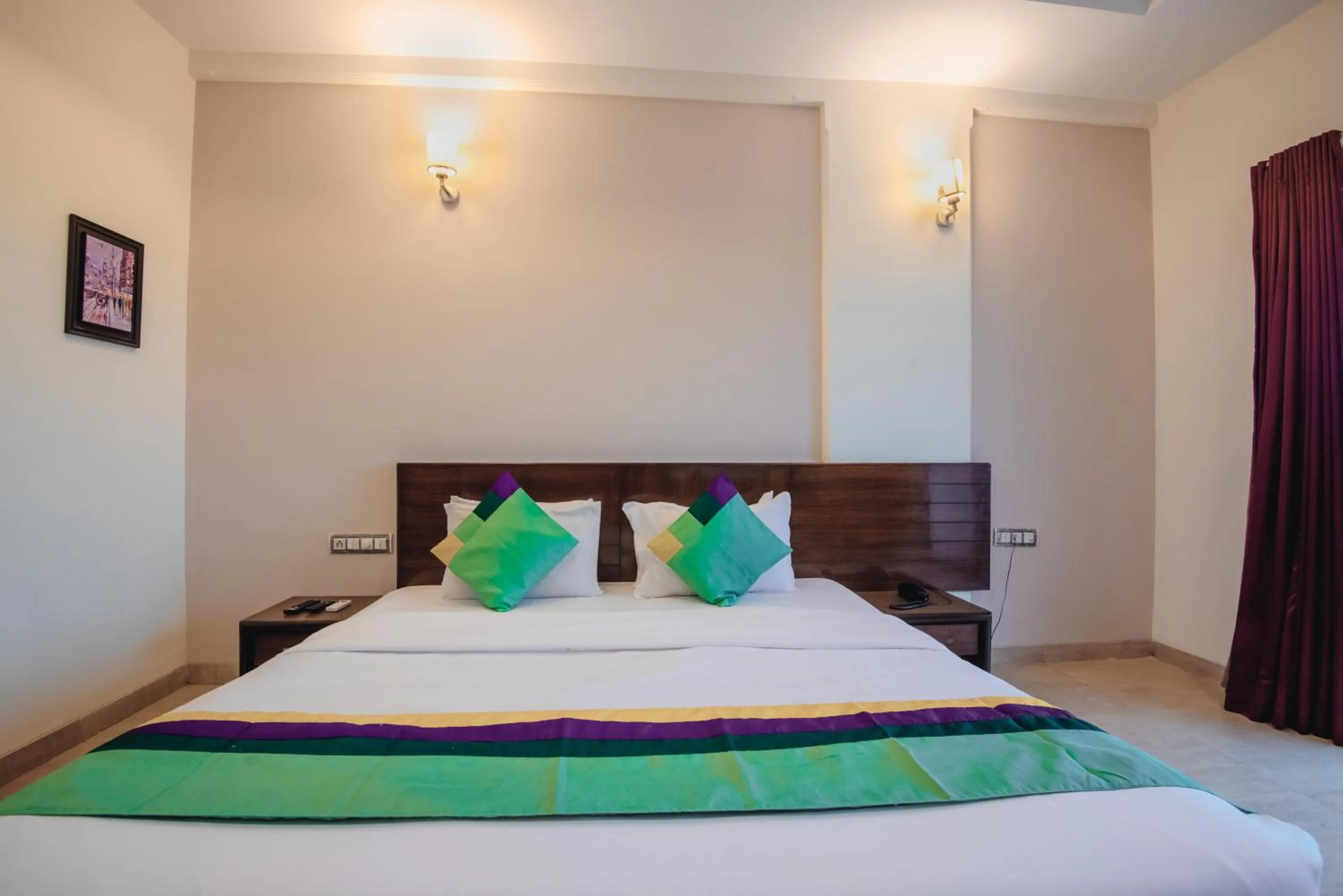 Bedroom, Bed in Treebo Reveniir Resort with Pool