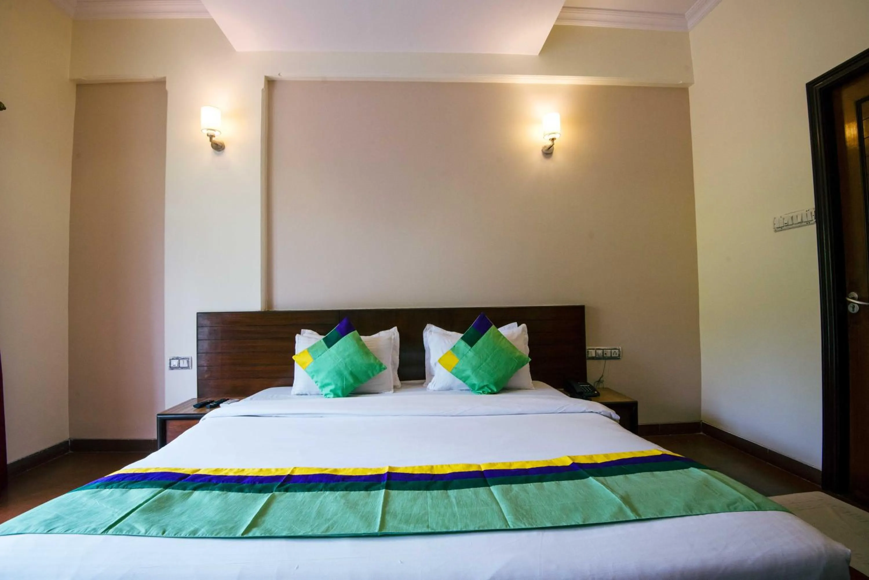 Bedroom, Bed in Treebo Reveniir Resort with Pool