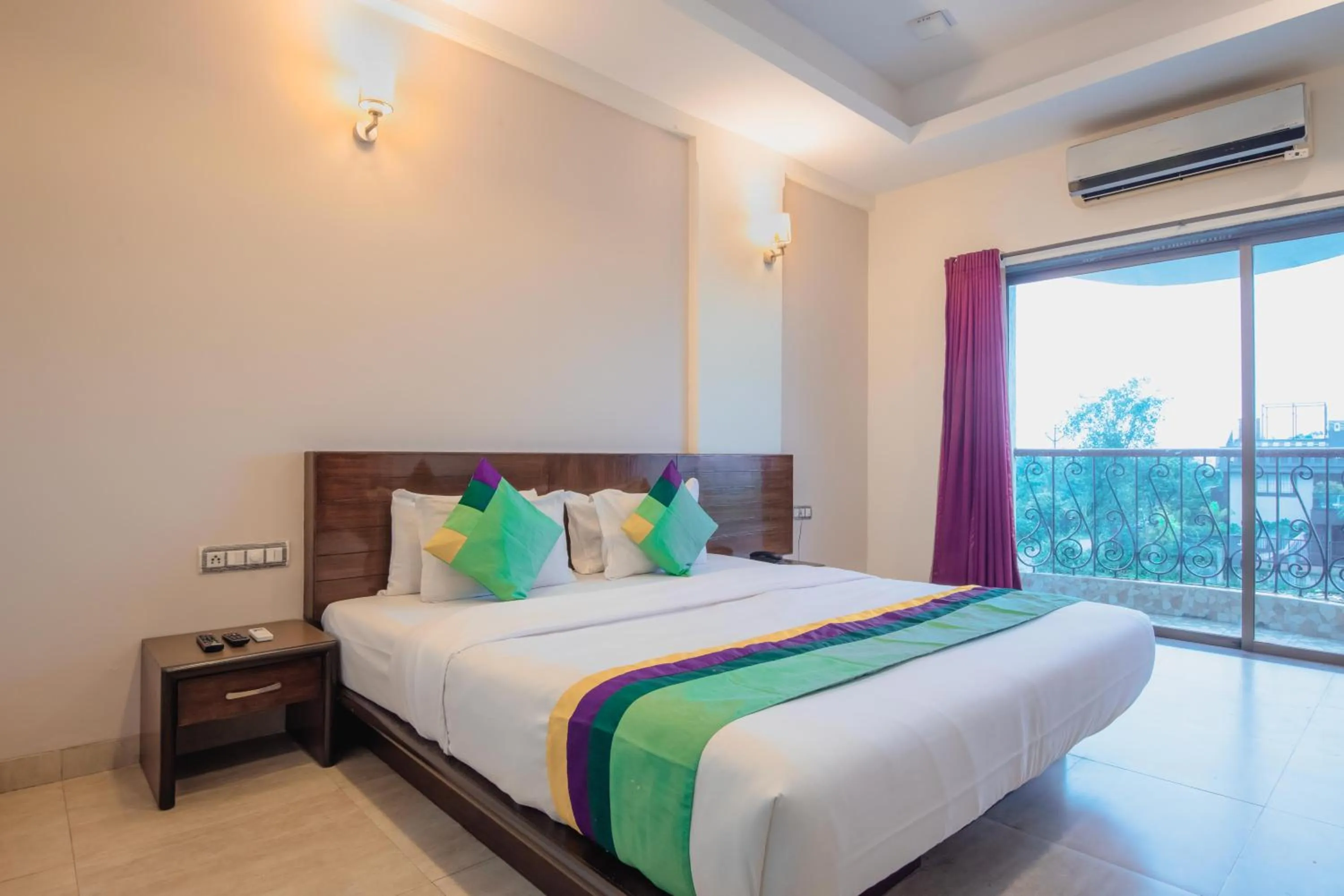 Bedroom, Bed in Treebo Reveniir Resort with Pool