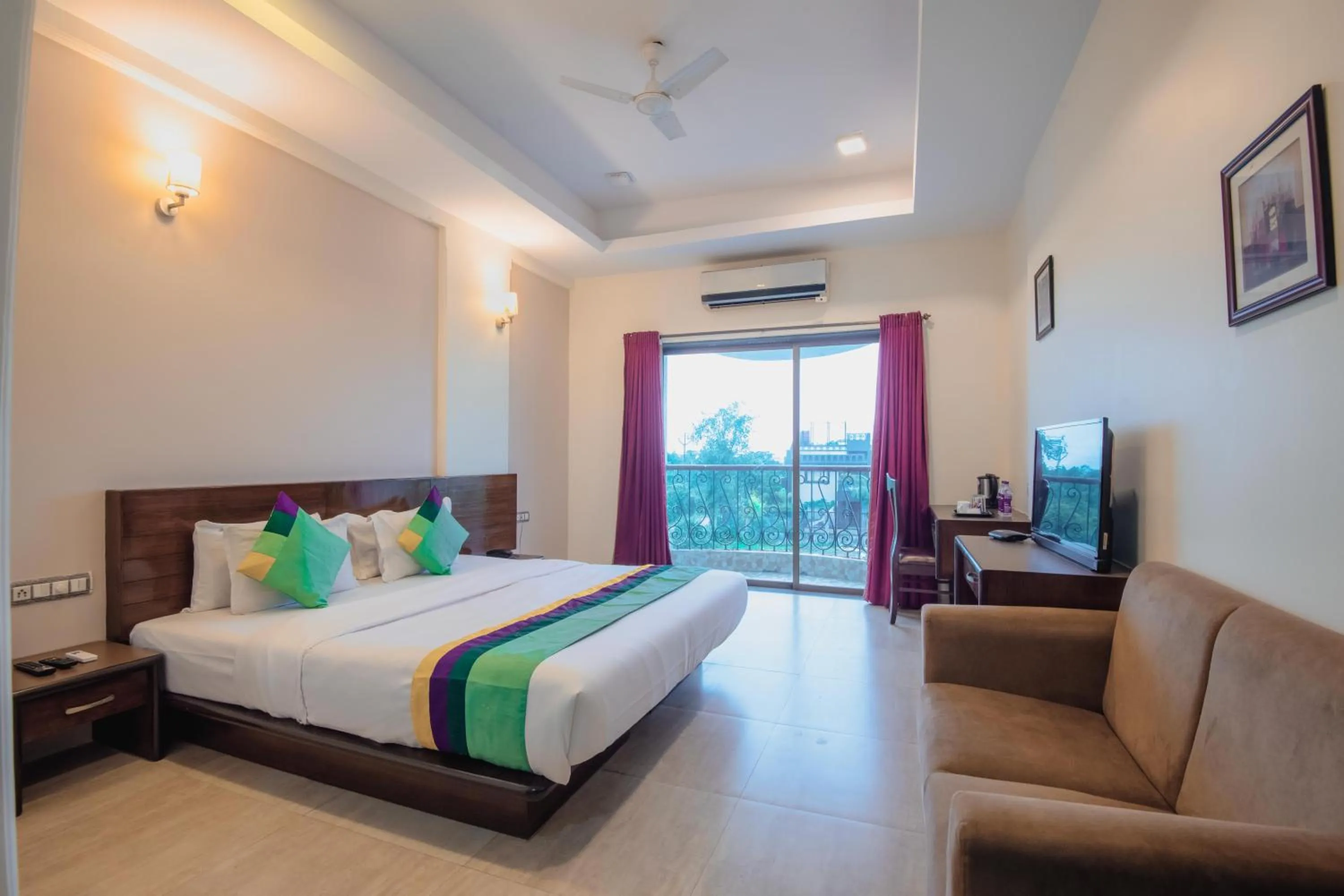 Bedroom, Bed in Treebo Reveniir Resort with Pool