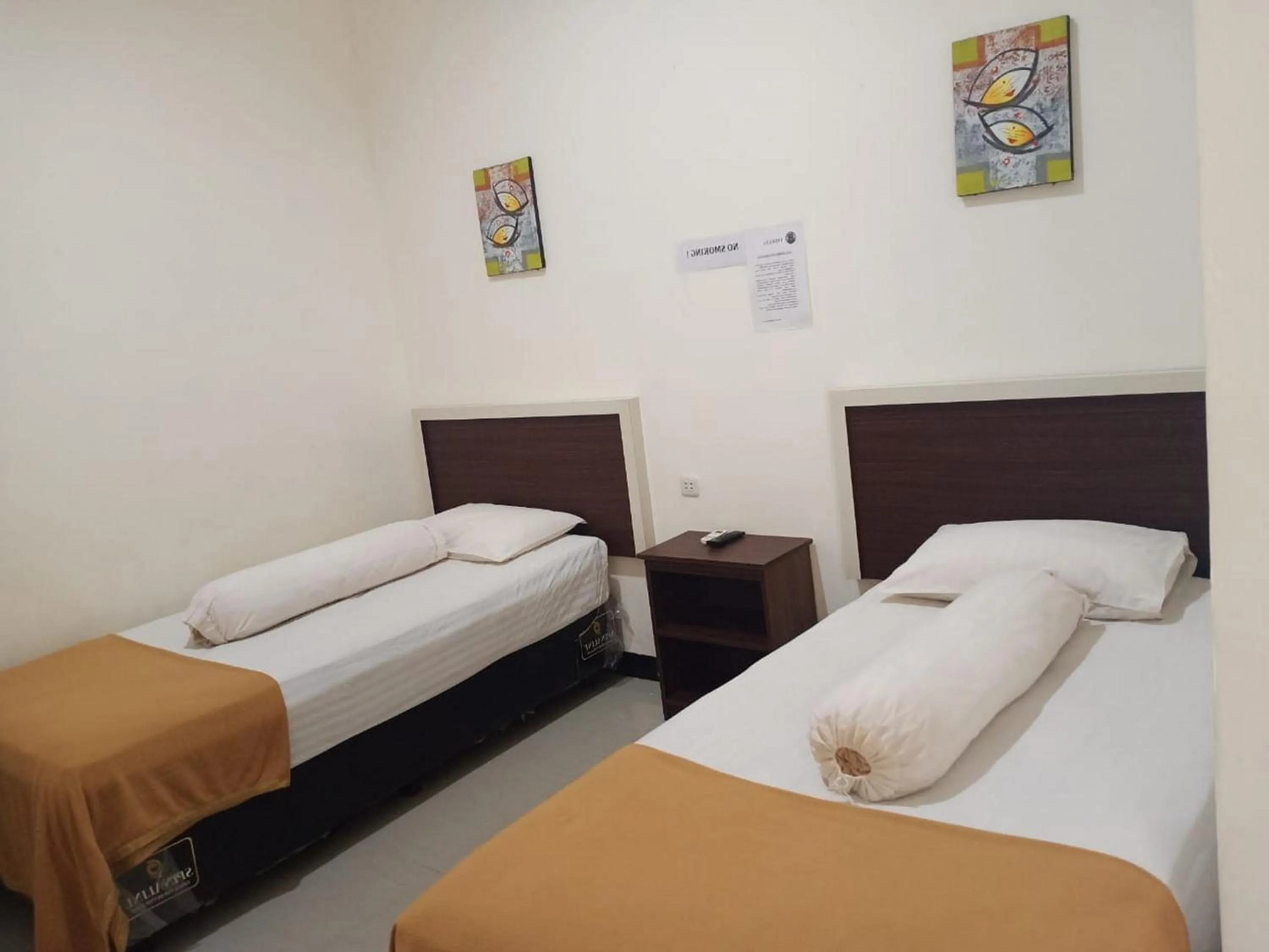 Bed in Fidelia Homestay Palu Mitra RedDoorz