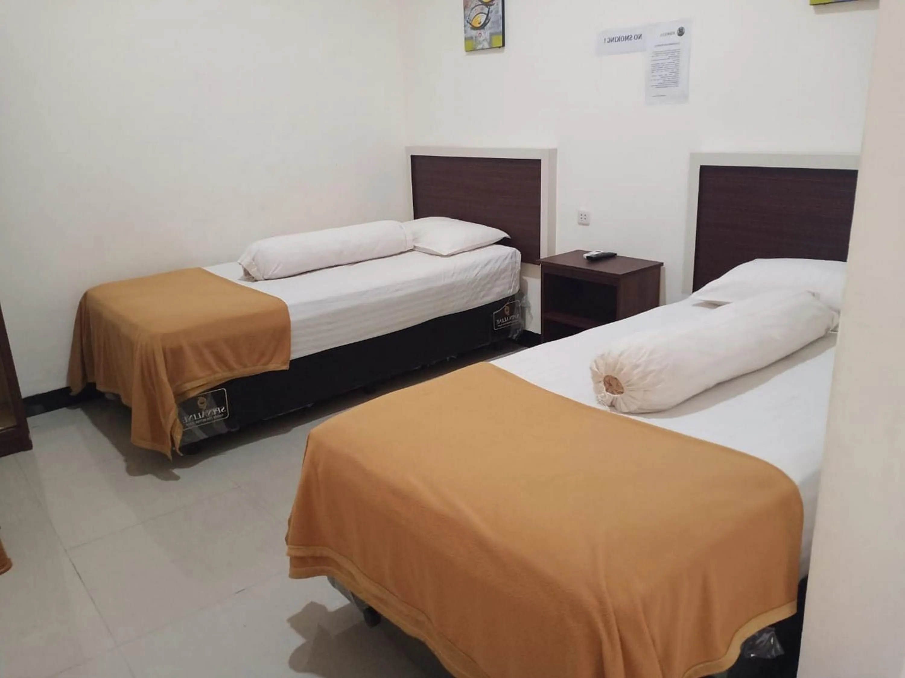 Bed in Fidelia Homestay Palu Mitra RedDoorz