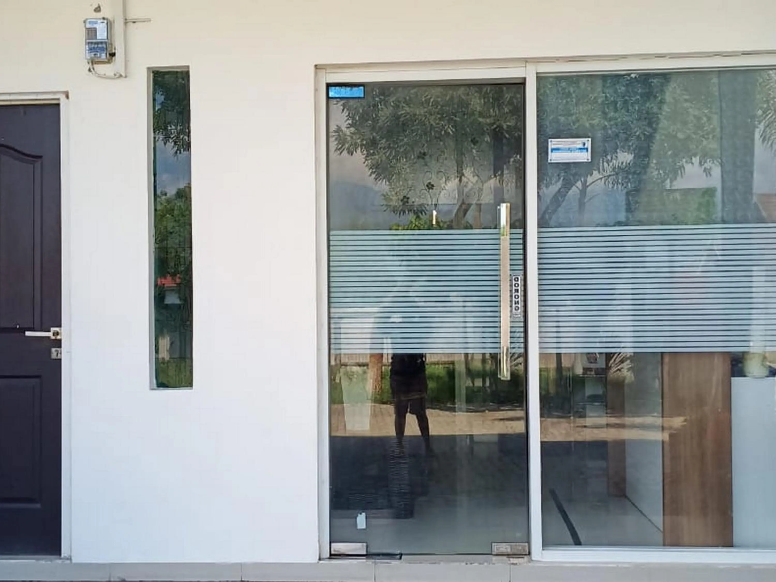 Facade/entrance in Fidelia Homestay Palu Mitra RedDoorz