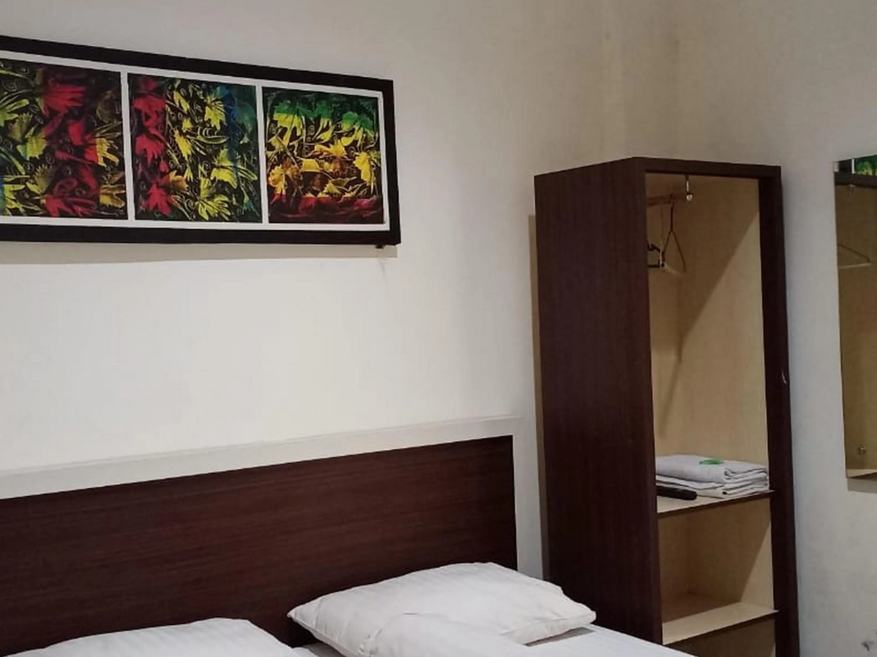 Bed in Fidelia Homestay Palu Mitra RedDoorz