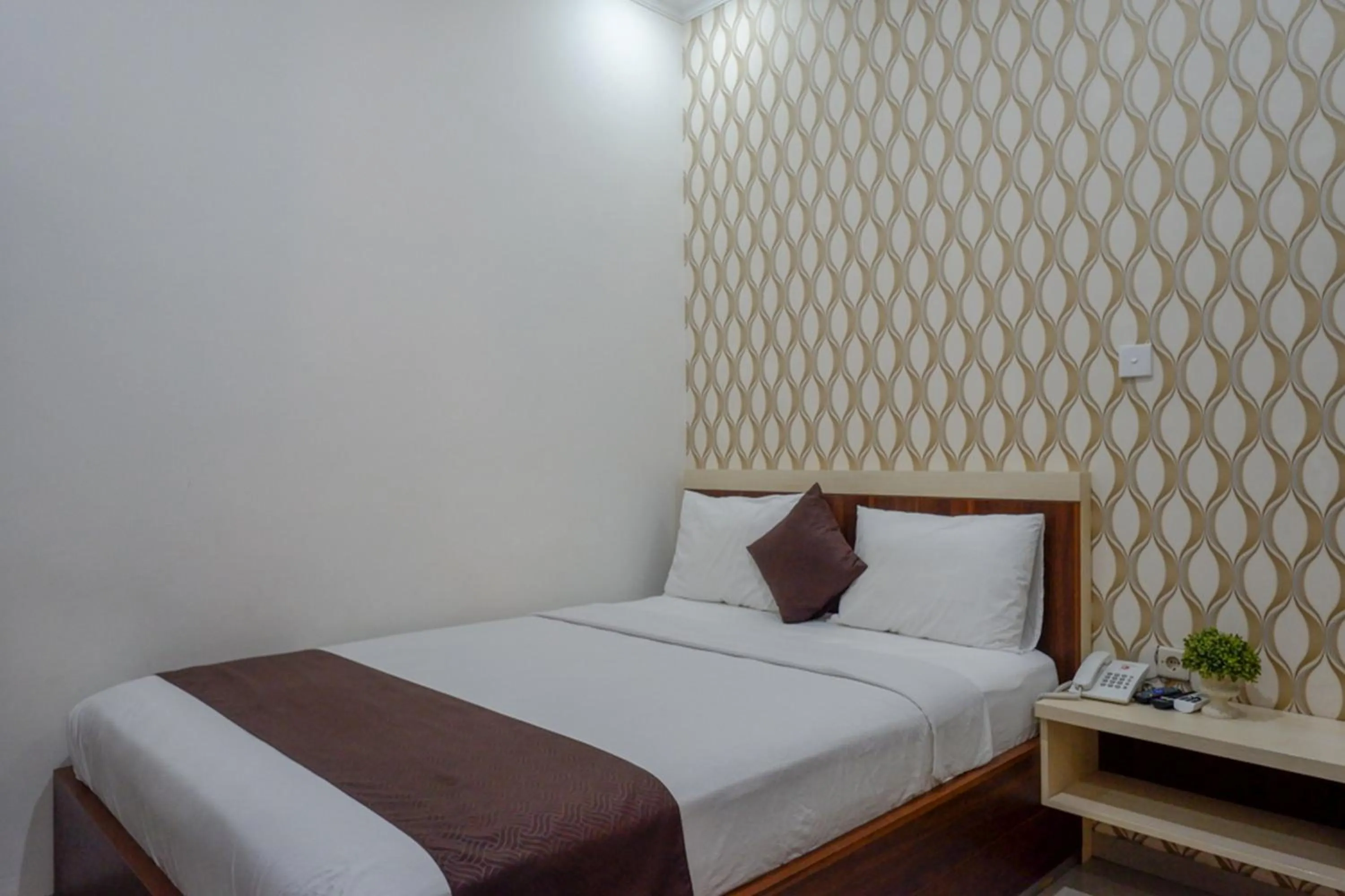 Bed in RedDoorz Syariah at Omah Sawah