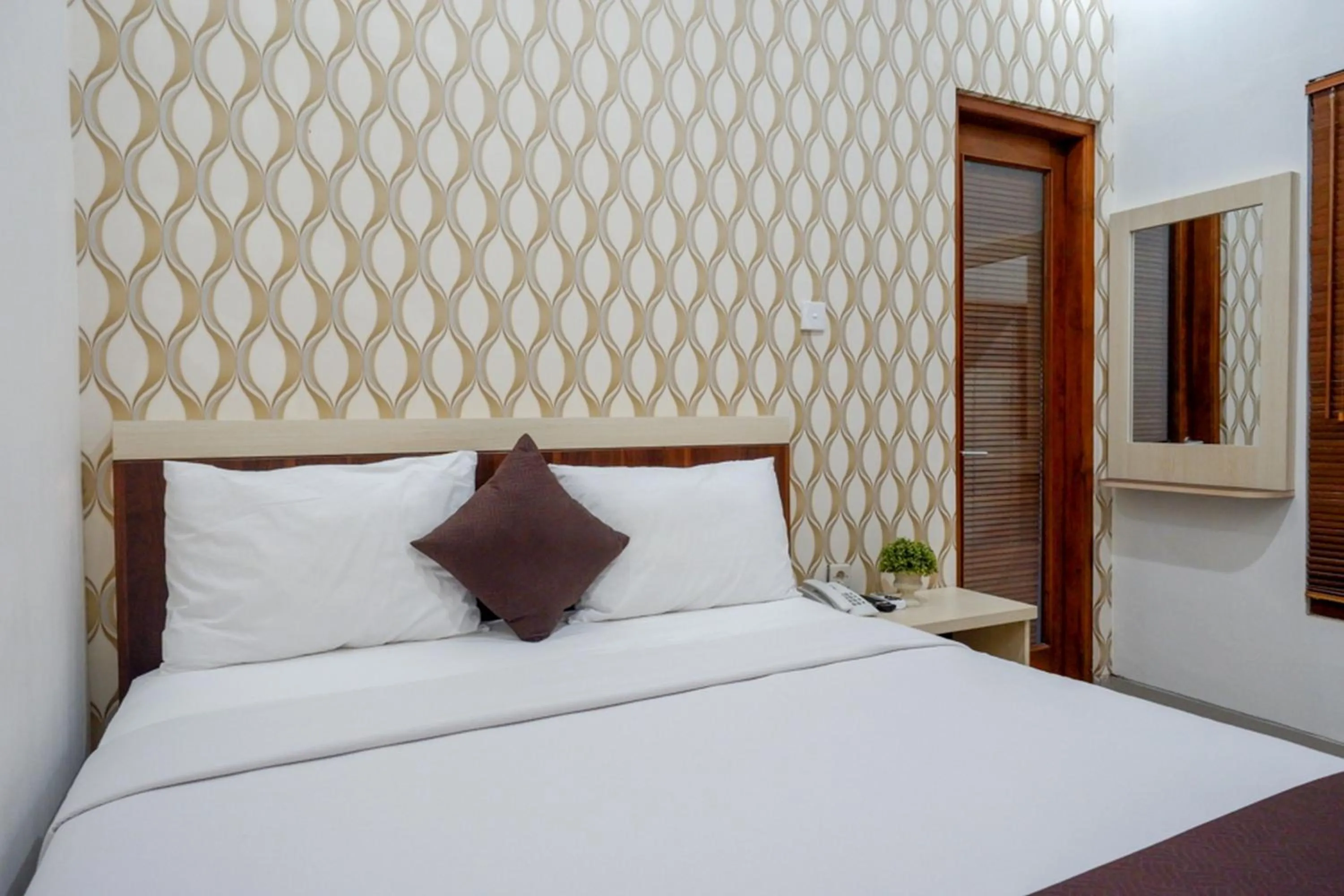 Bed in RedDoorz Syariah at Omah Sawah