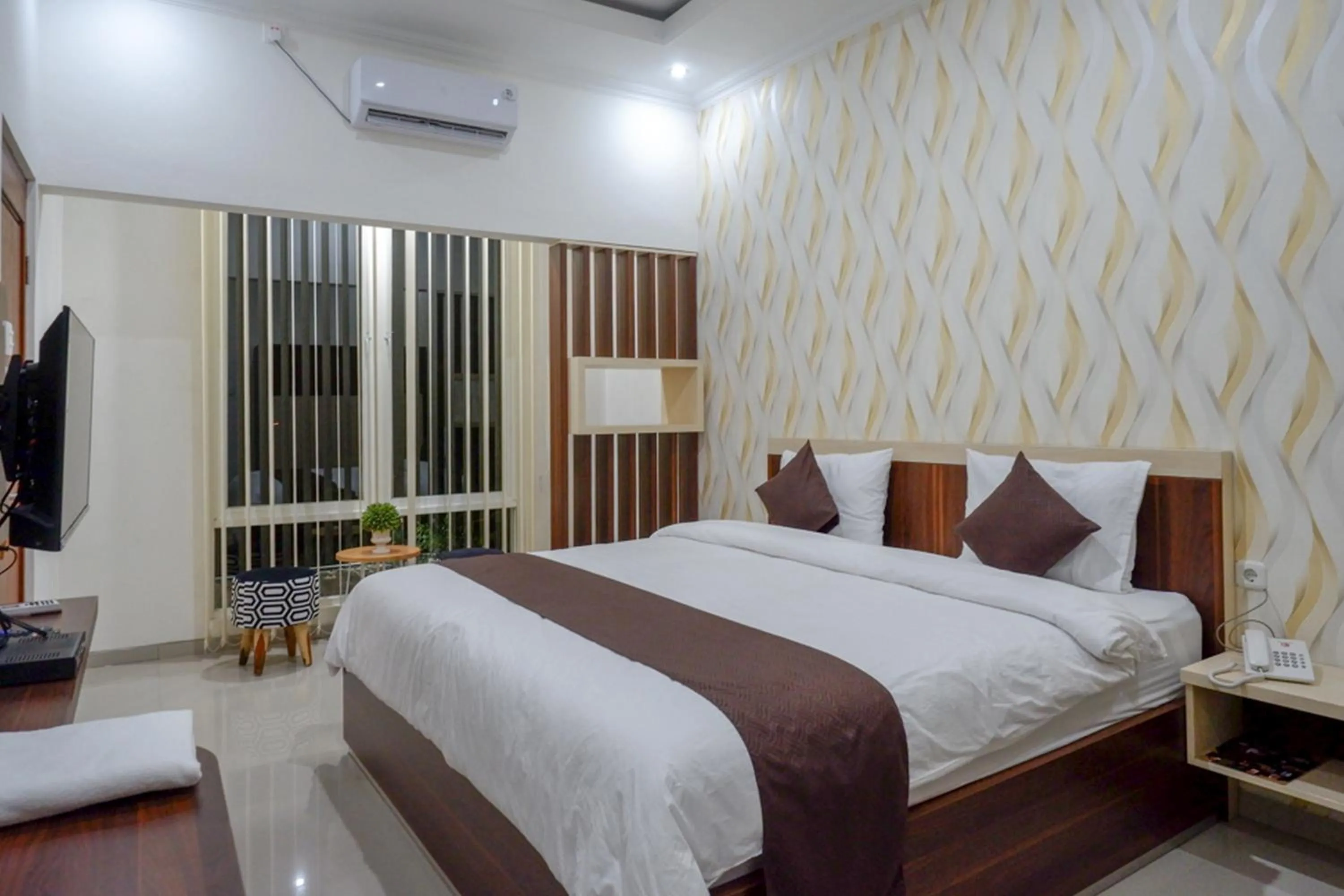 Bed in RedDoorz Syariah at Omah Sawah