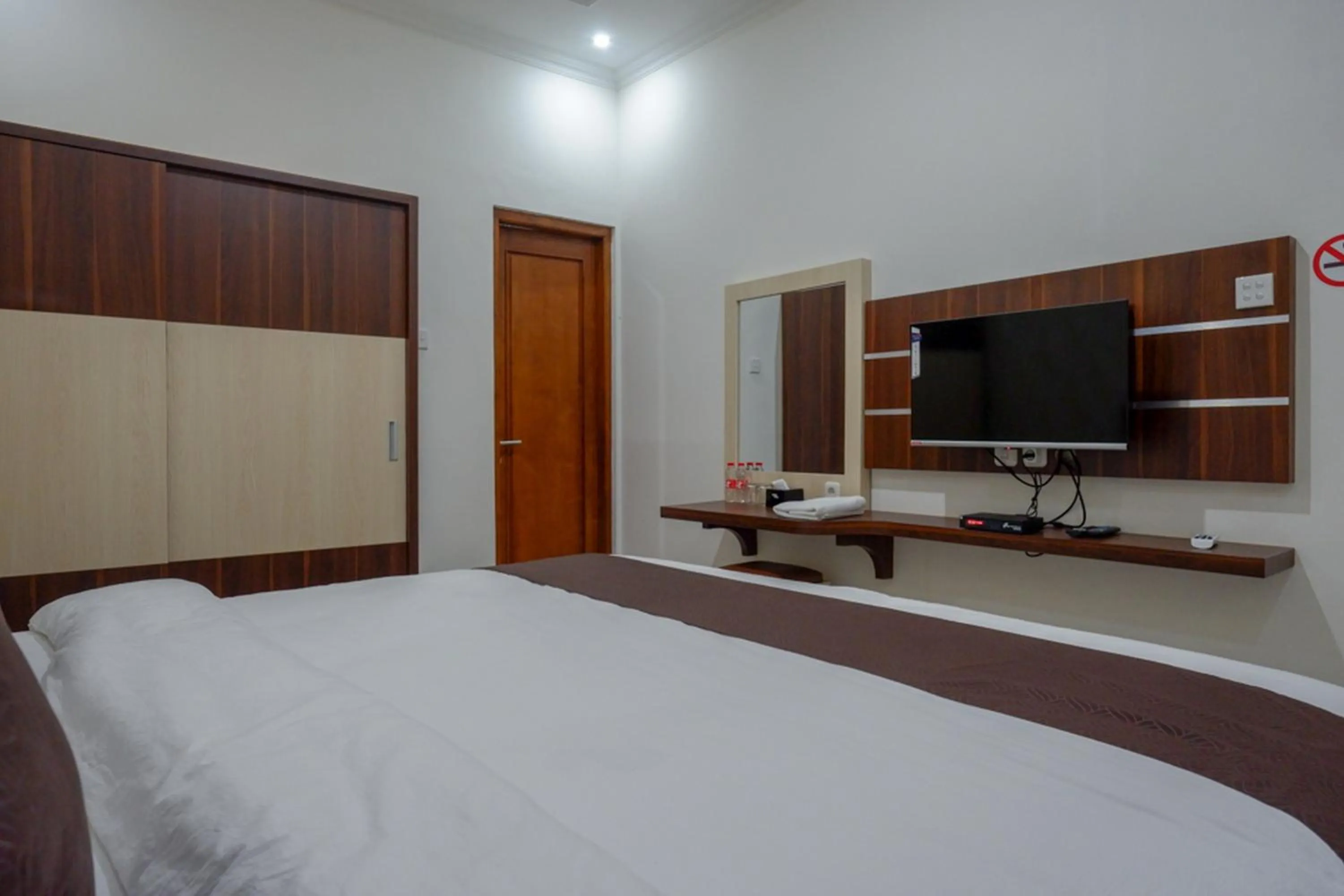 Bed in RedDoorz Syariah at Omah Sawah