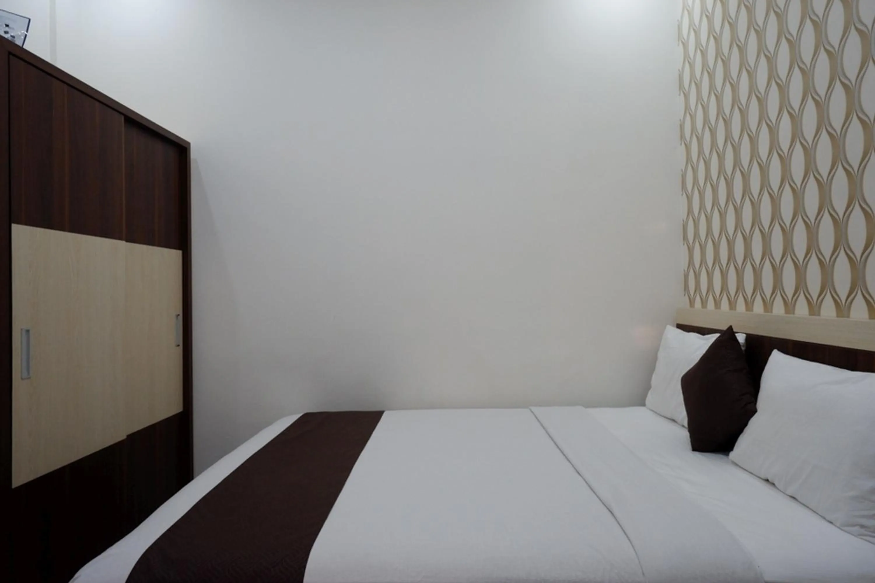 Bed in RedDoorz Syariah at Omah Sawah