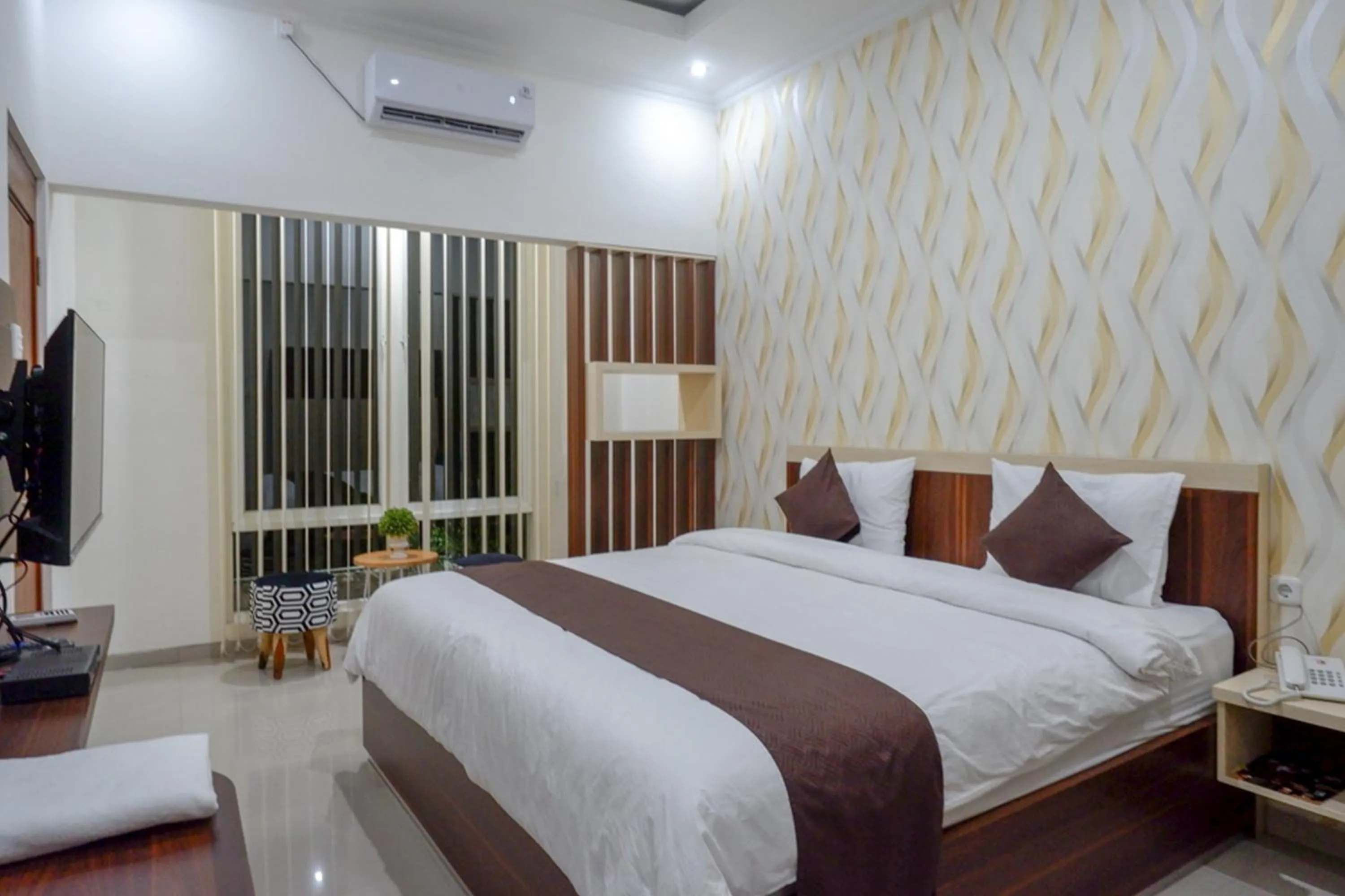 Bed in RedDoorz Syariah at Omah Sawah