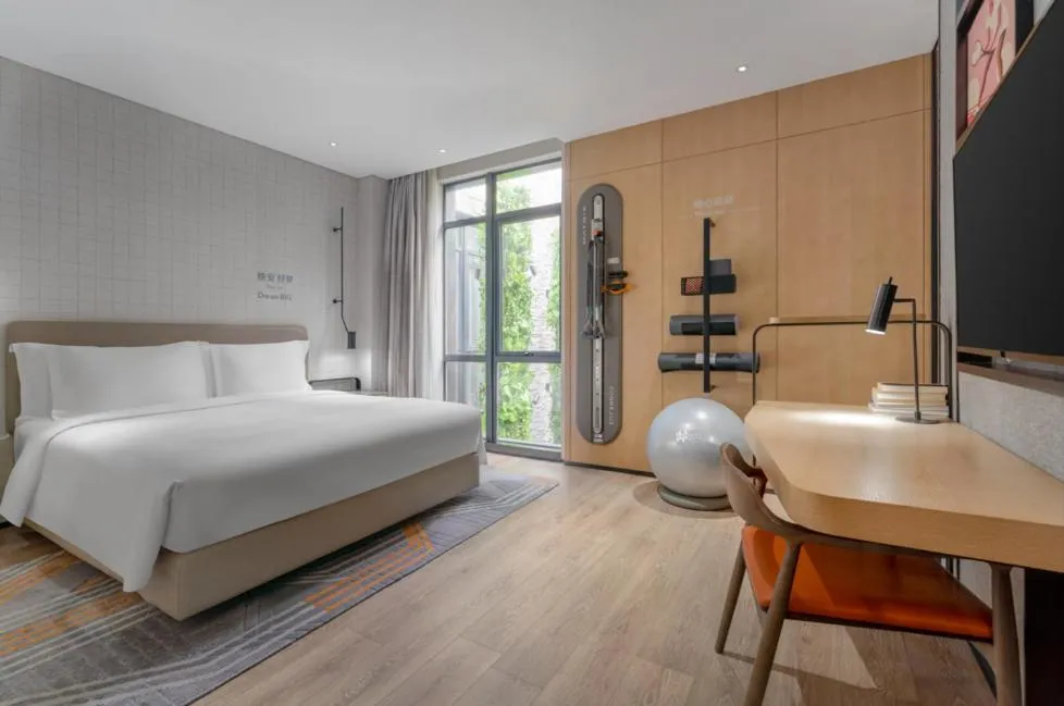 Bed in EVEN Hotel Shenzhen Nanshan by IHG