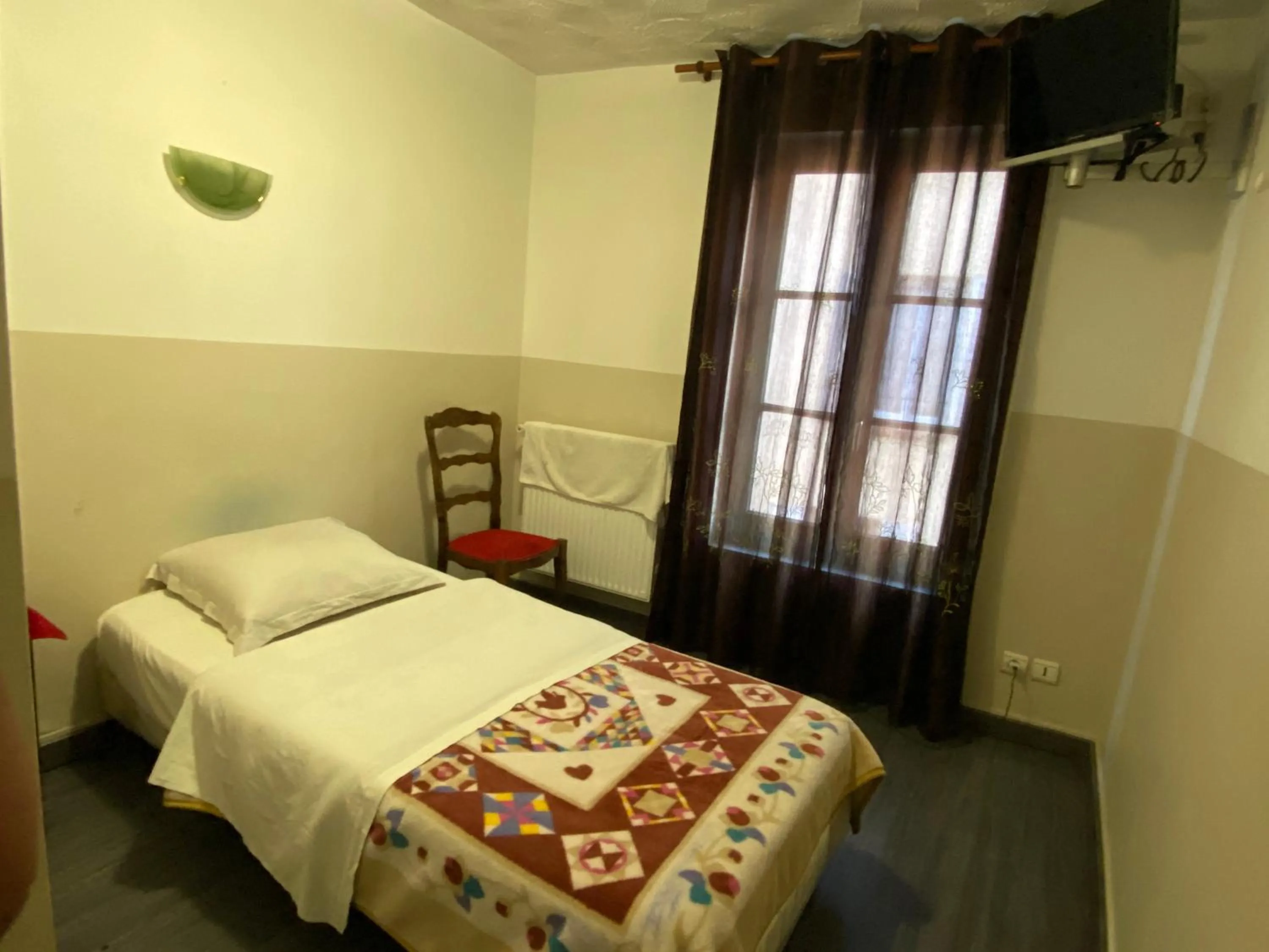 Bed in Hotel Normandy