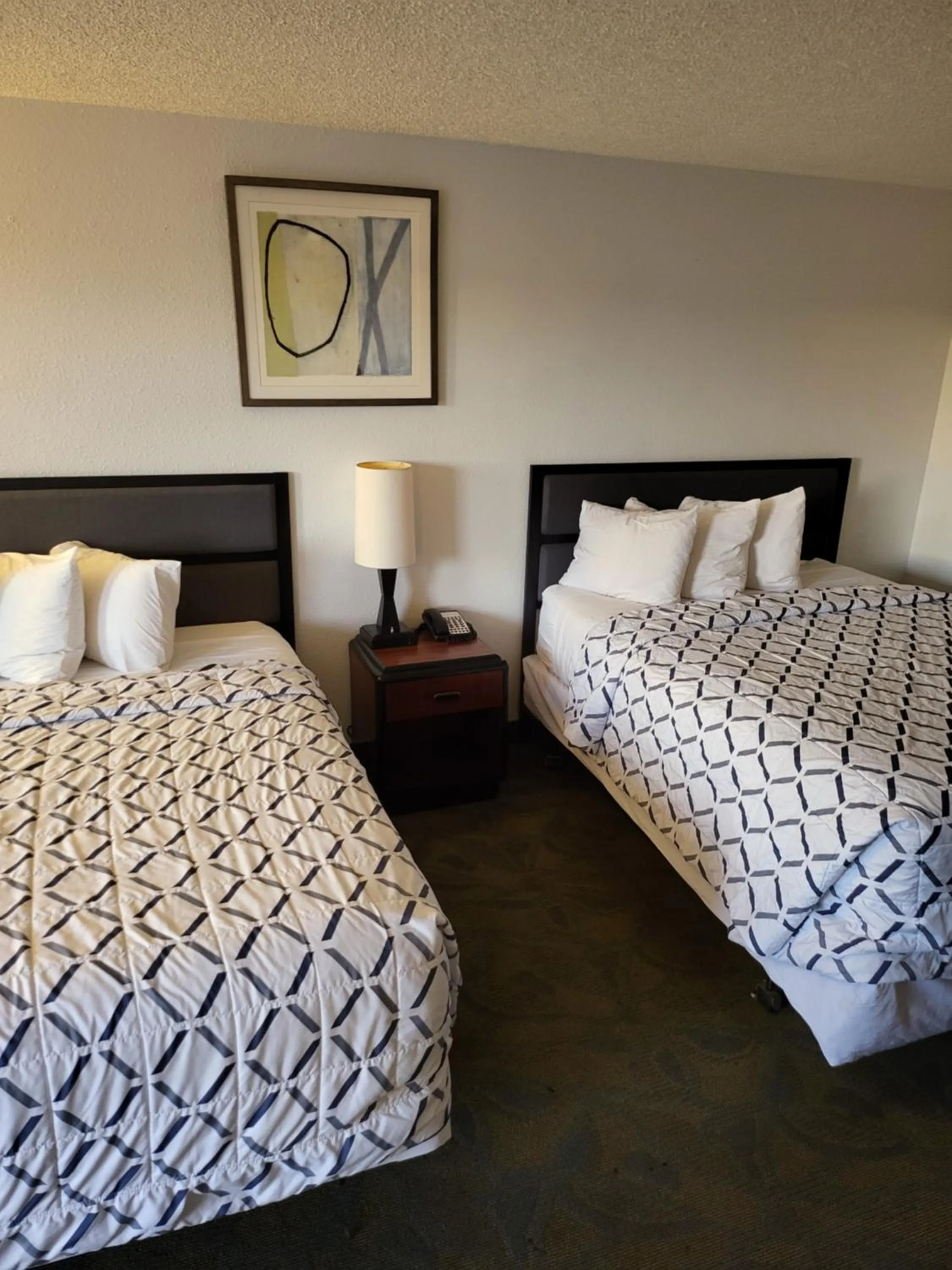 Bed in Smokey Point Motor Inn