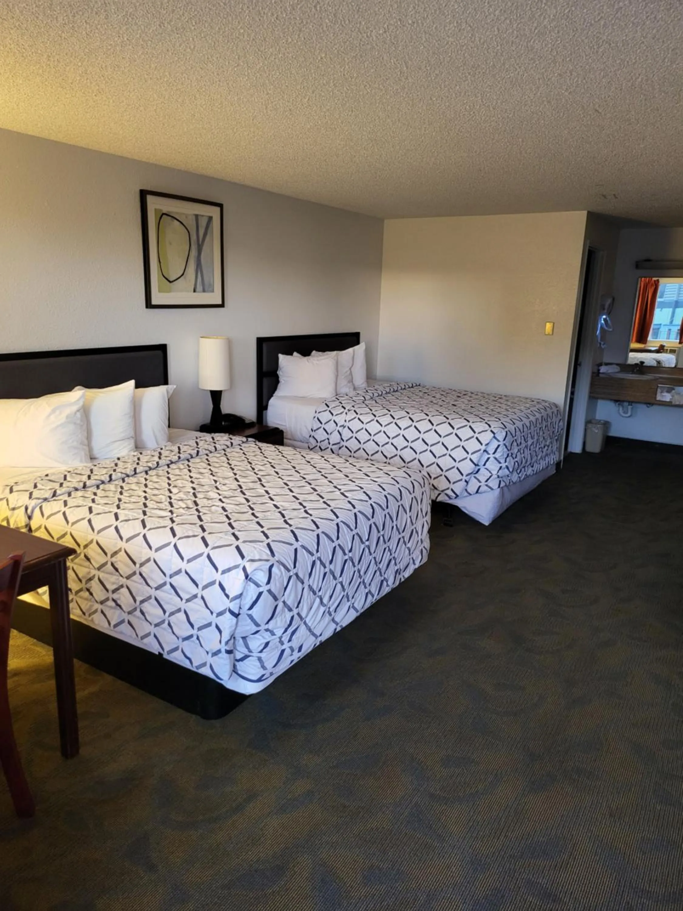 Bed in Smokey Point Motor Inn