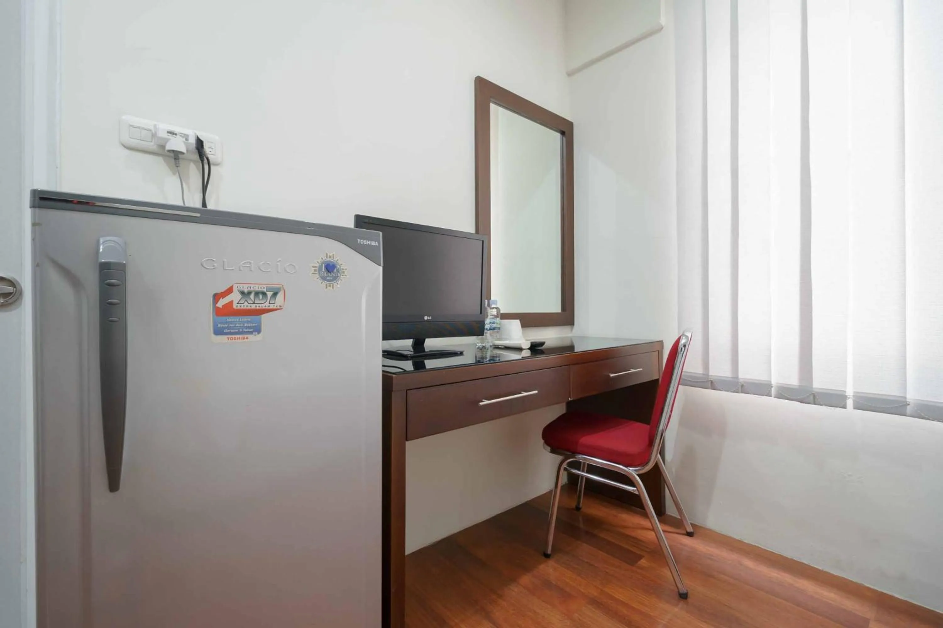 TV and multimedia in Avalon Karawaci Mitra RedDoorz