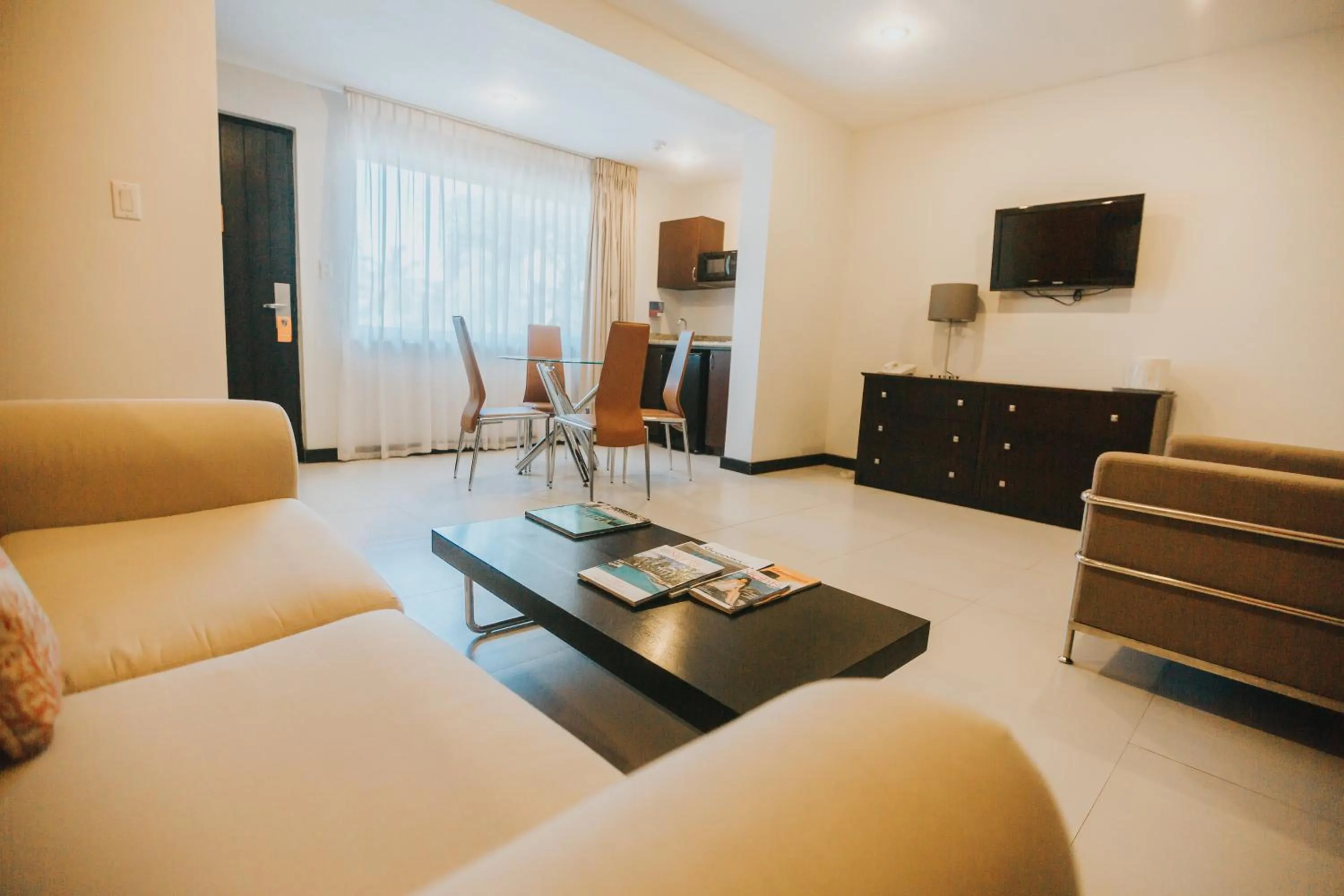 Living room in Talk of the Town Beach Hotel & Beach Club by GH Hoteles