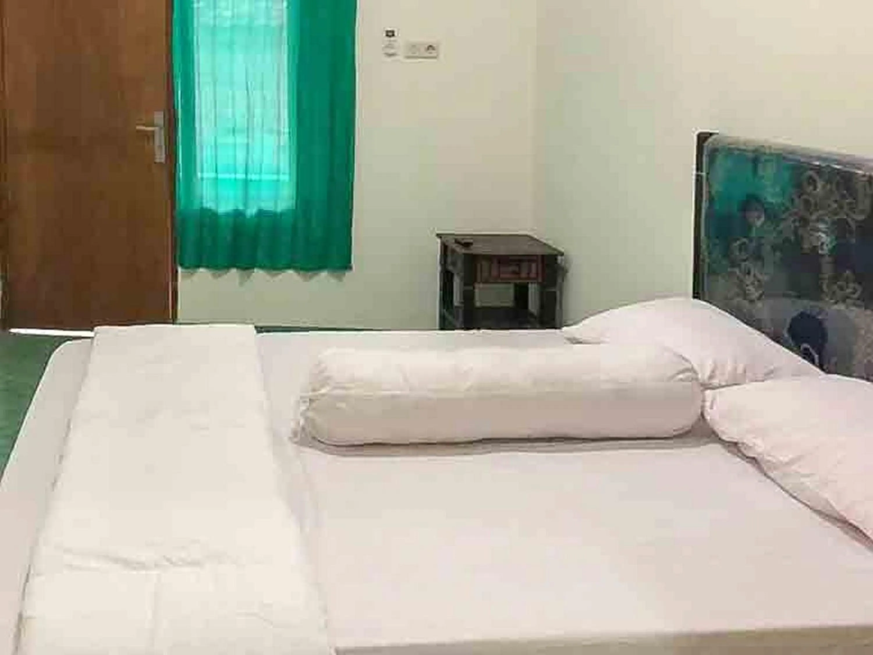 Bed in Griya Fadamas Syariah near Taman Hijau Demangan Madiun Mitra RedDoorz