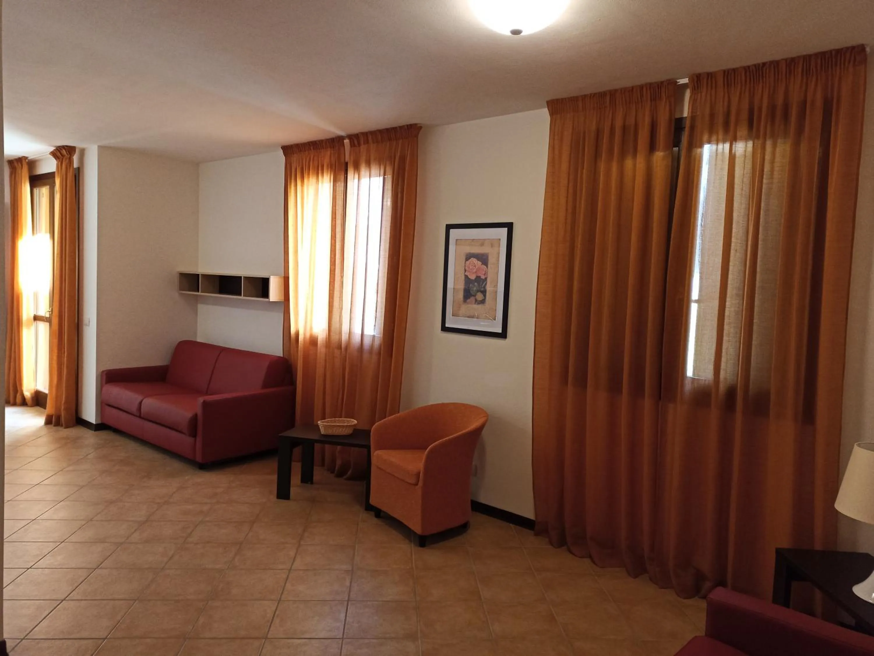 Communal lounge/ TV room, Bed in Residence le Polle