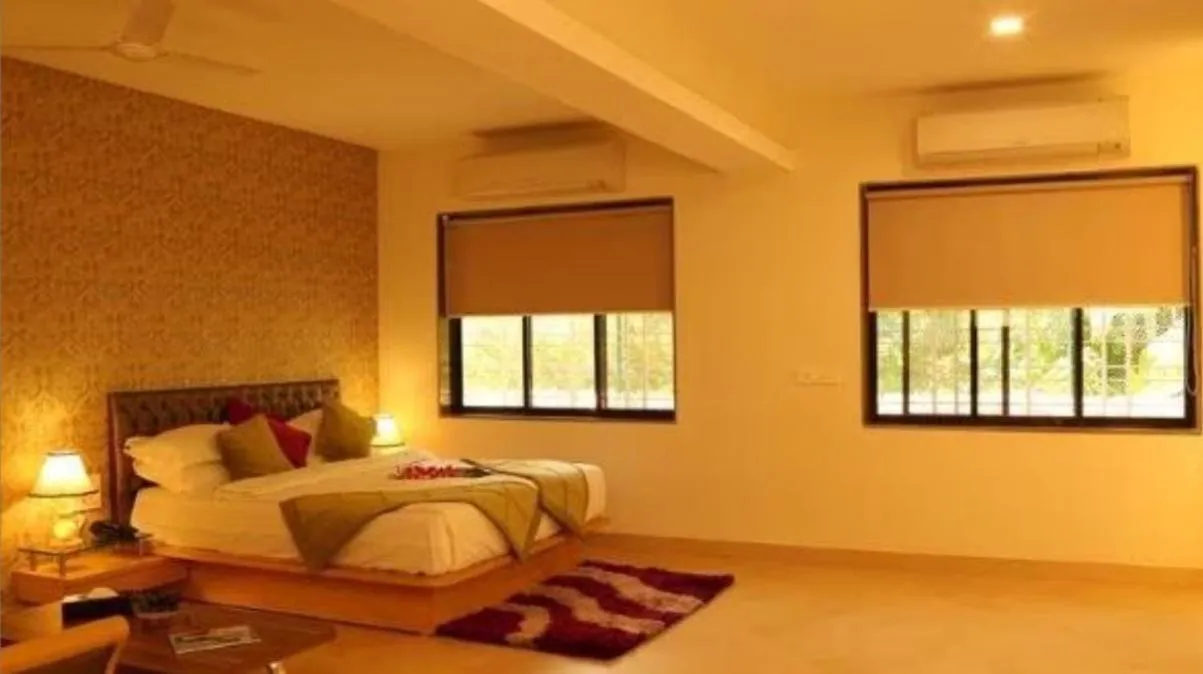 Bed in Meritas Seawind Beach Resort, Shrivardhan