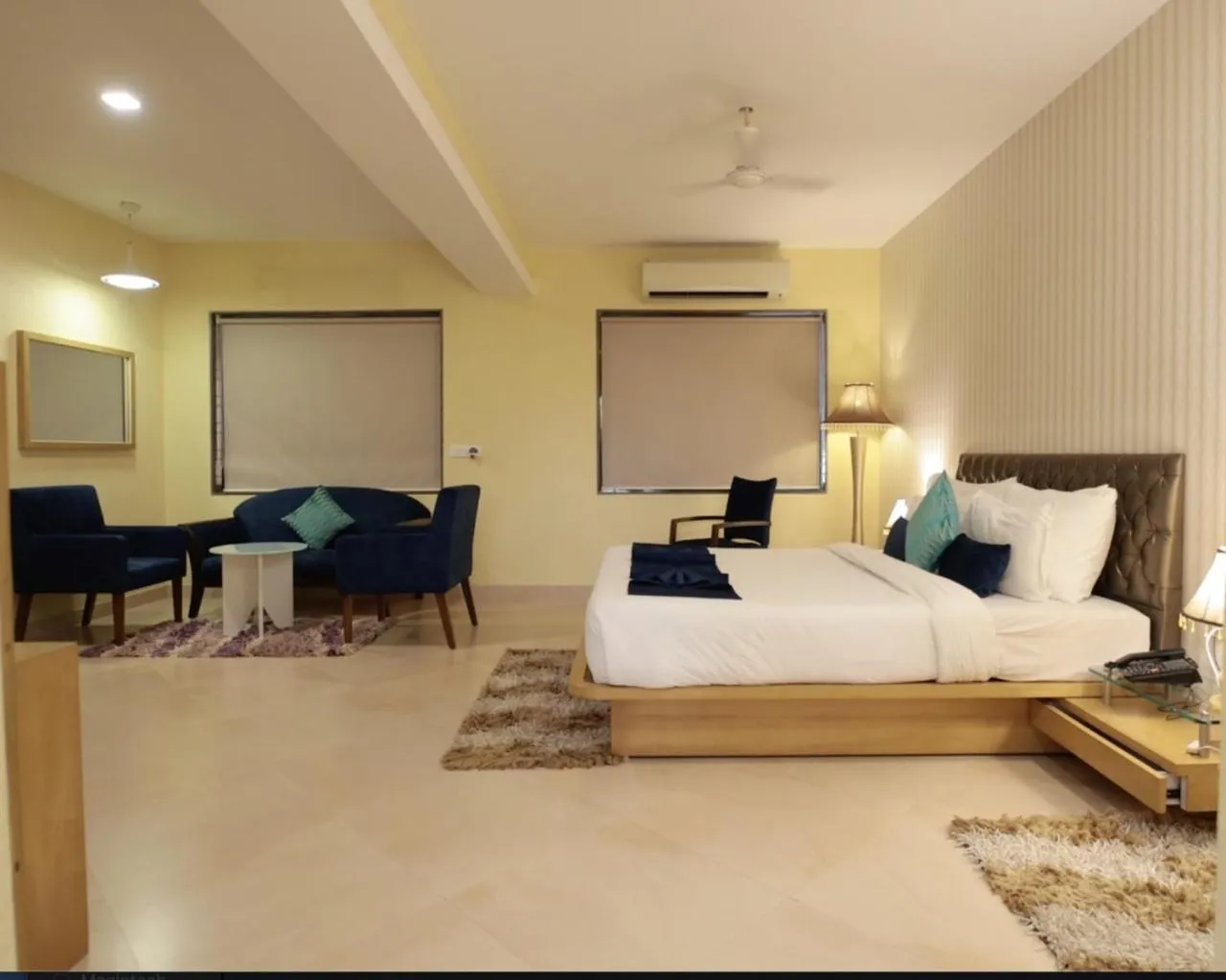 Bed in Meritas Seawind Beach Resort, Shrivardhan