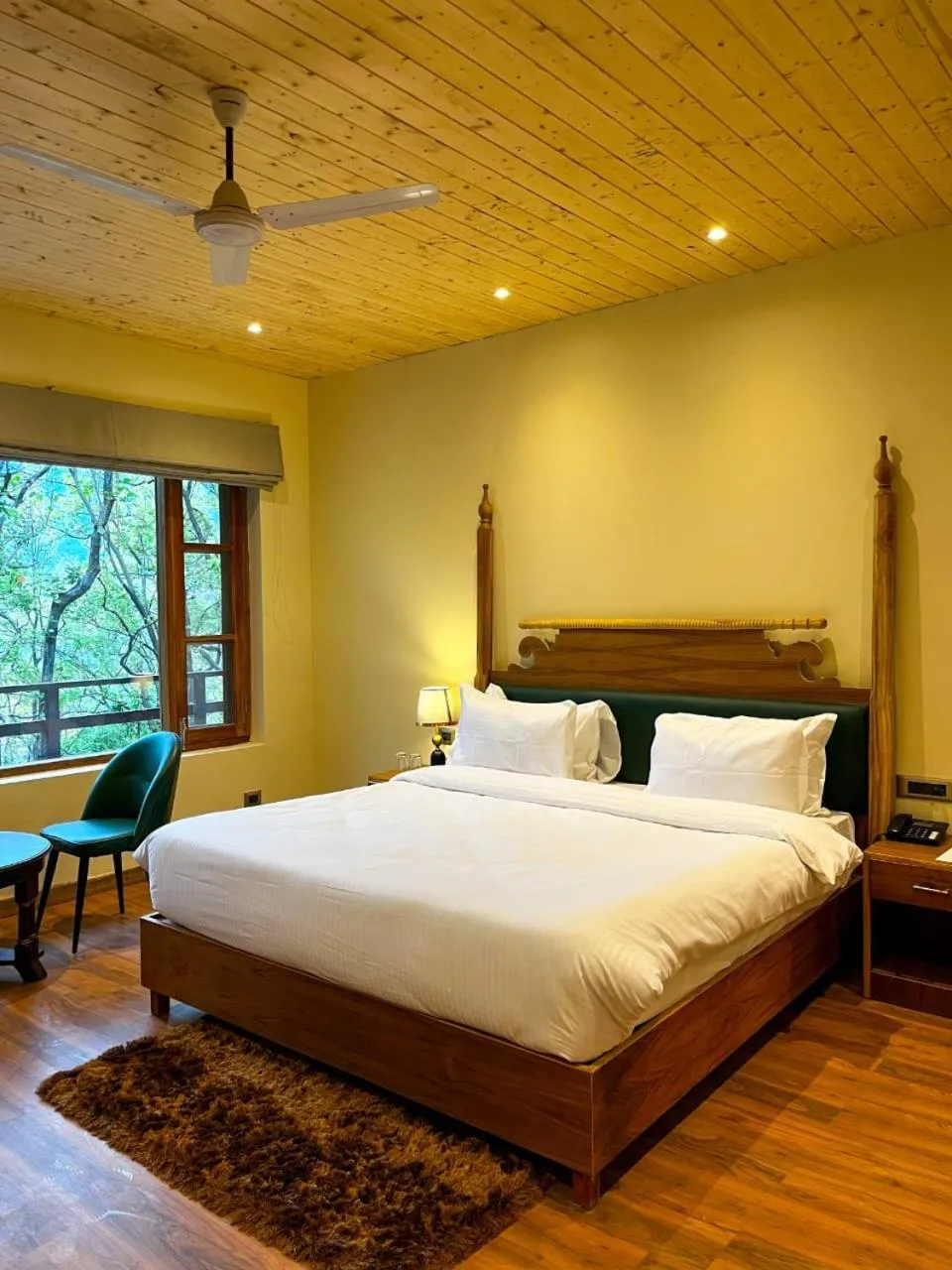 Bed in Punarnava Resort & Spa
