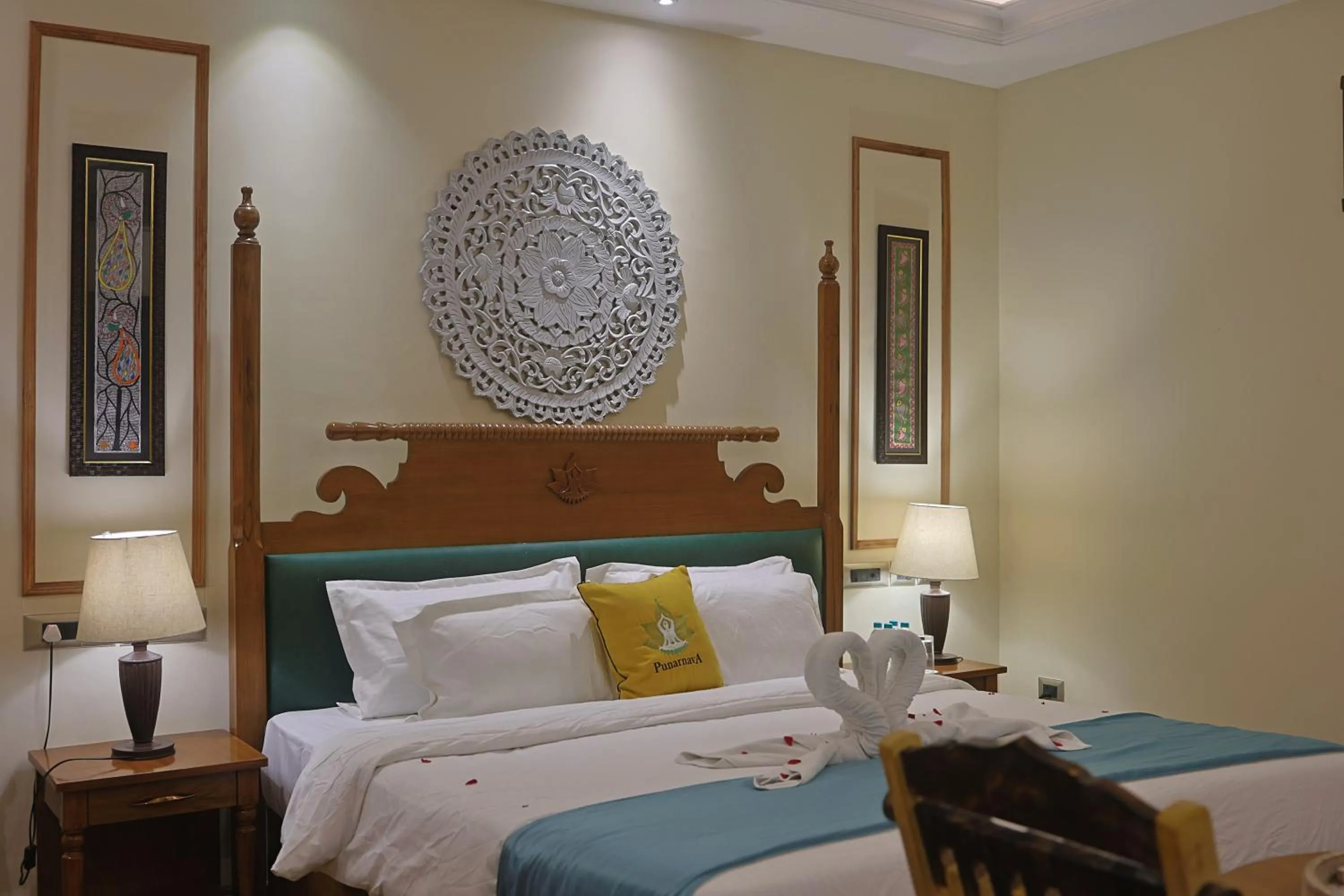 Bed in Punarnava Resort & Spa