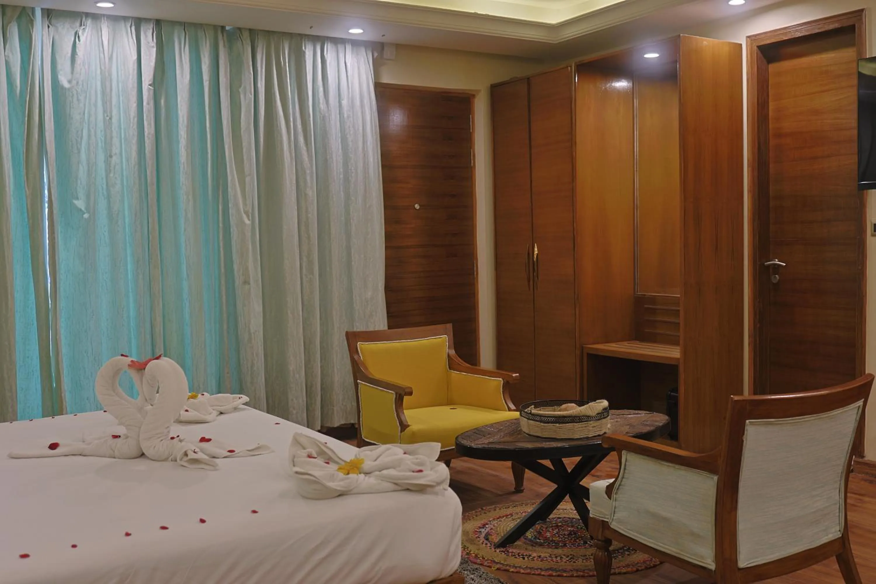 Bed in Punarnava Resort & Spa