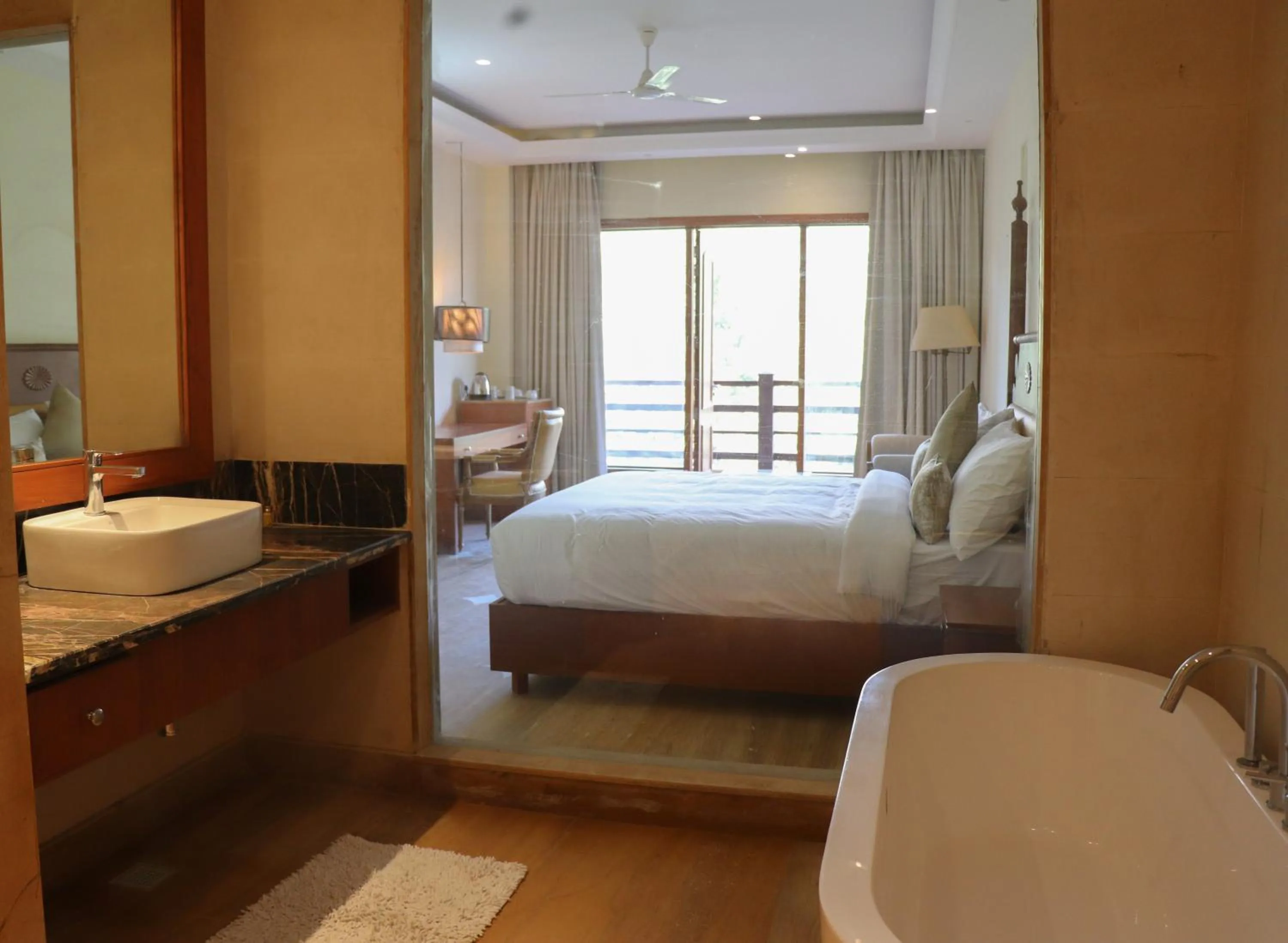 Bathroom, Bed in Punarnava Resort & Spa