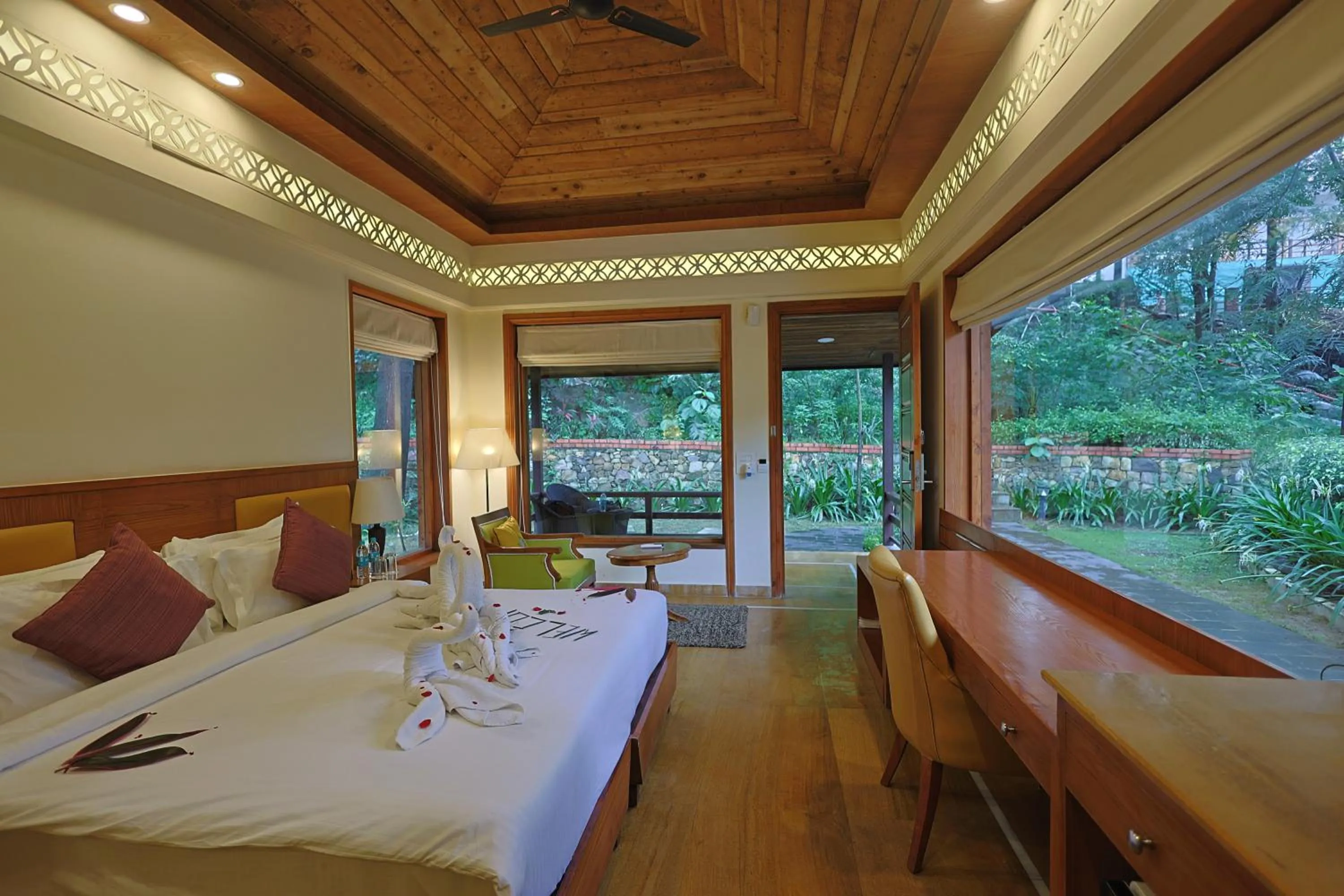 Bed in Punarnava Resort & Spa
