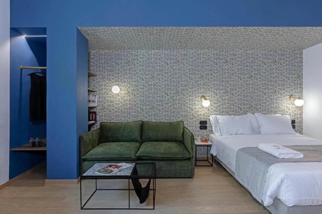 Bed in Acro Urban Suites