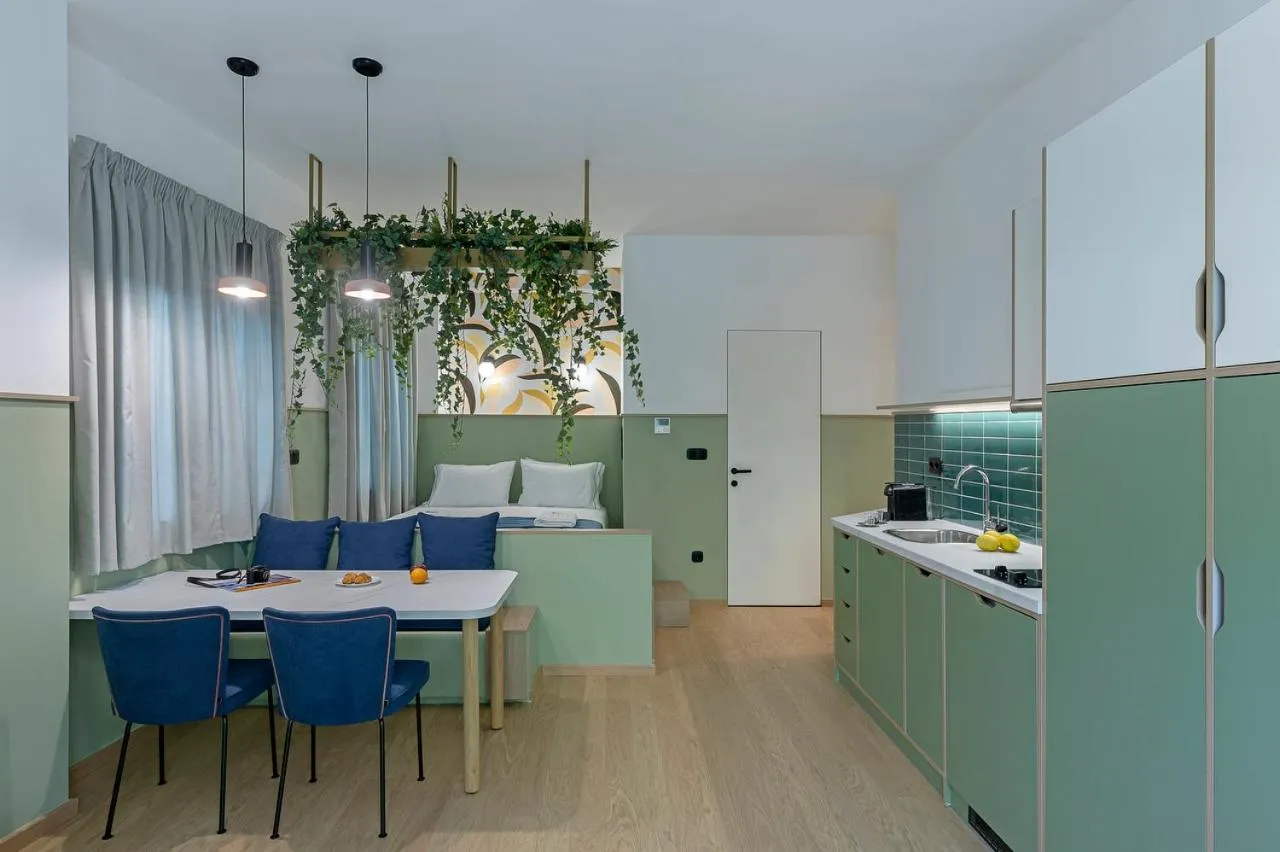 Bed in Acro Urban Suites