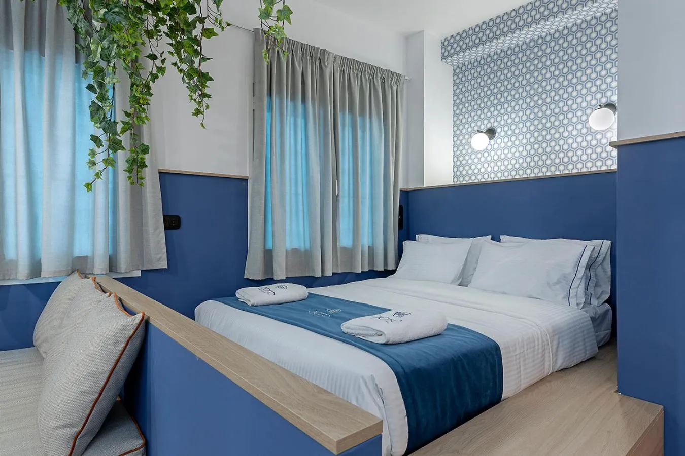Bed in Acro Urban Suites