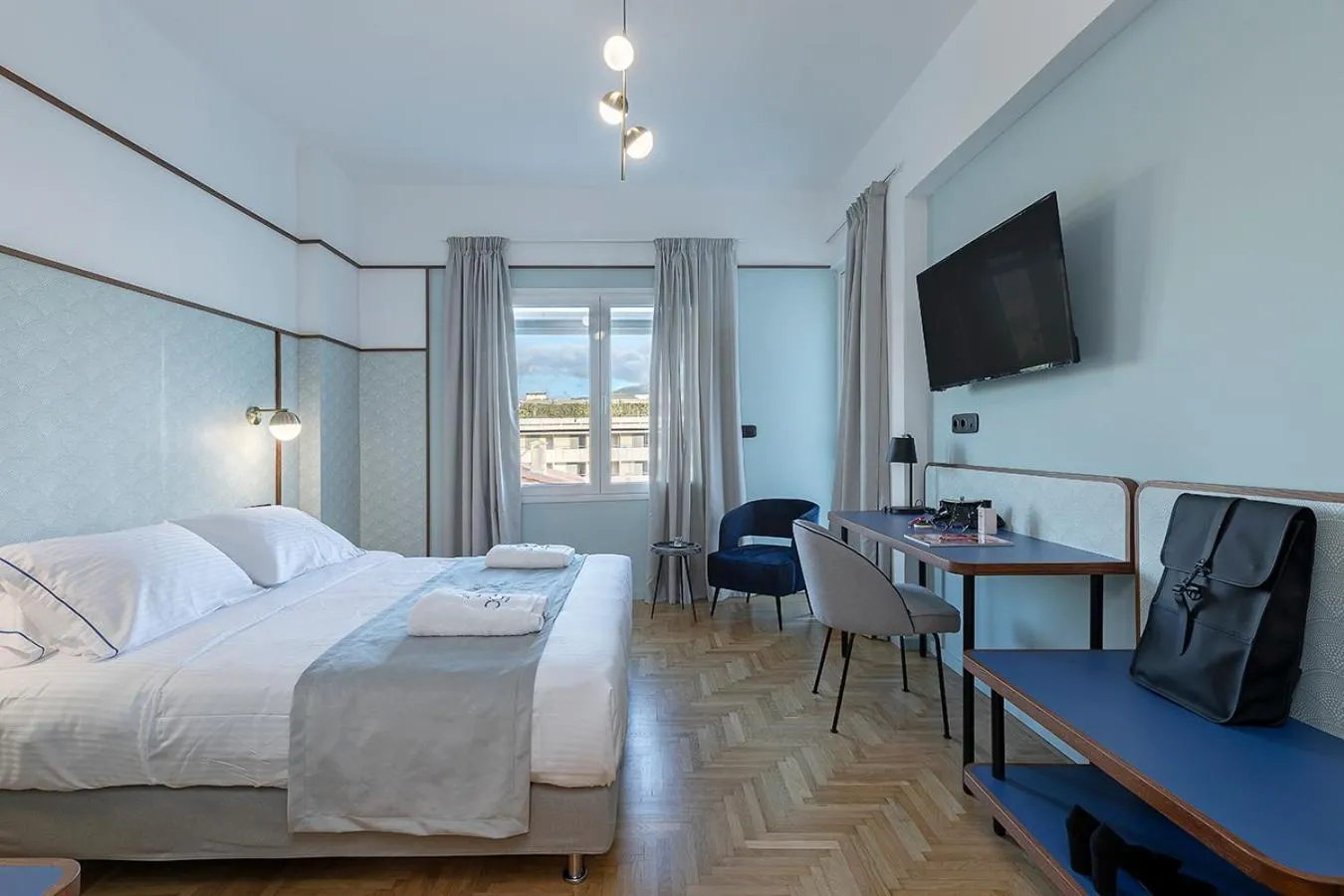 Bed in Acro Urban Suites