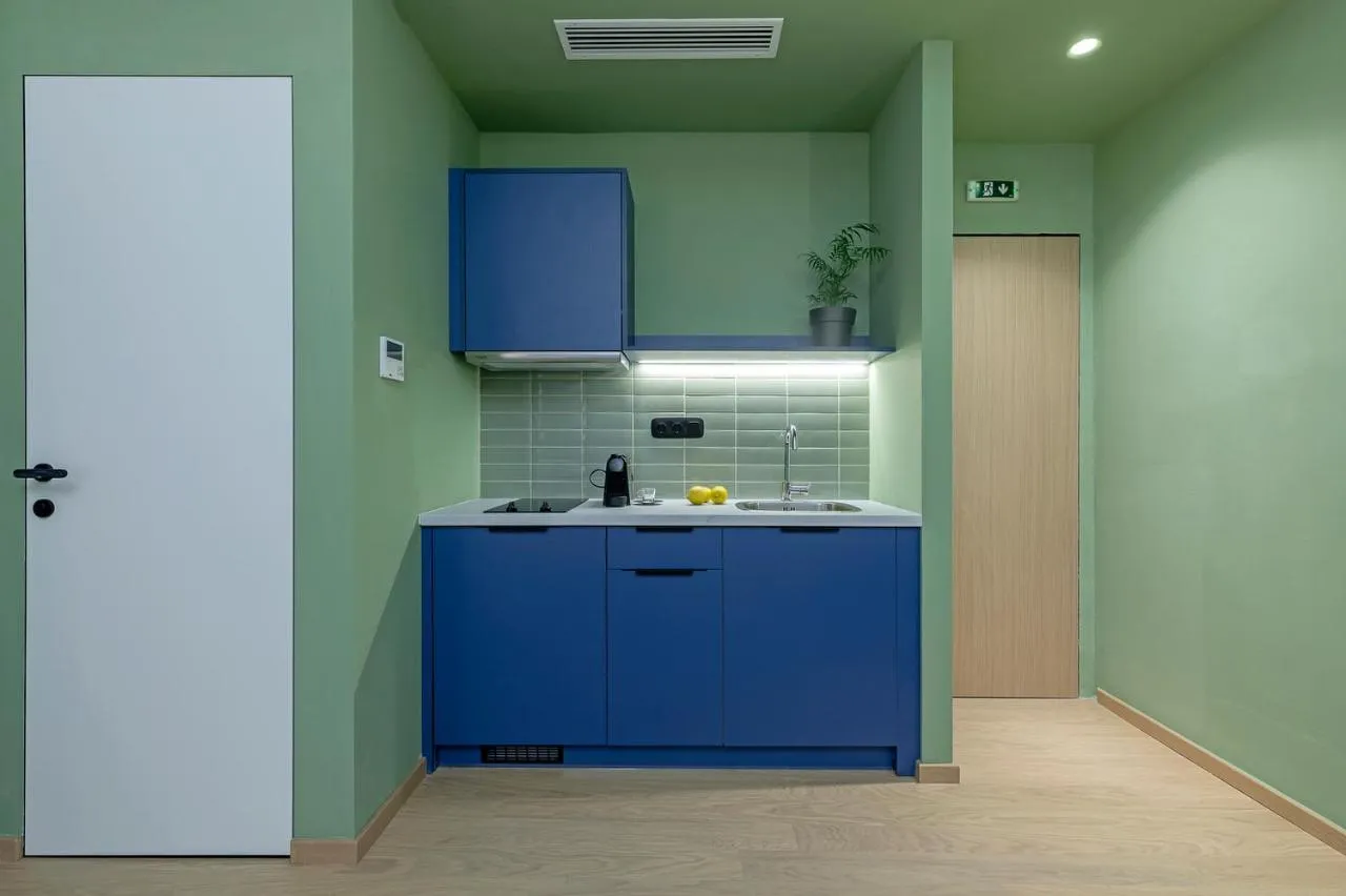 Kitchen or kitchenette in Acro Urban Suites
