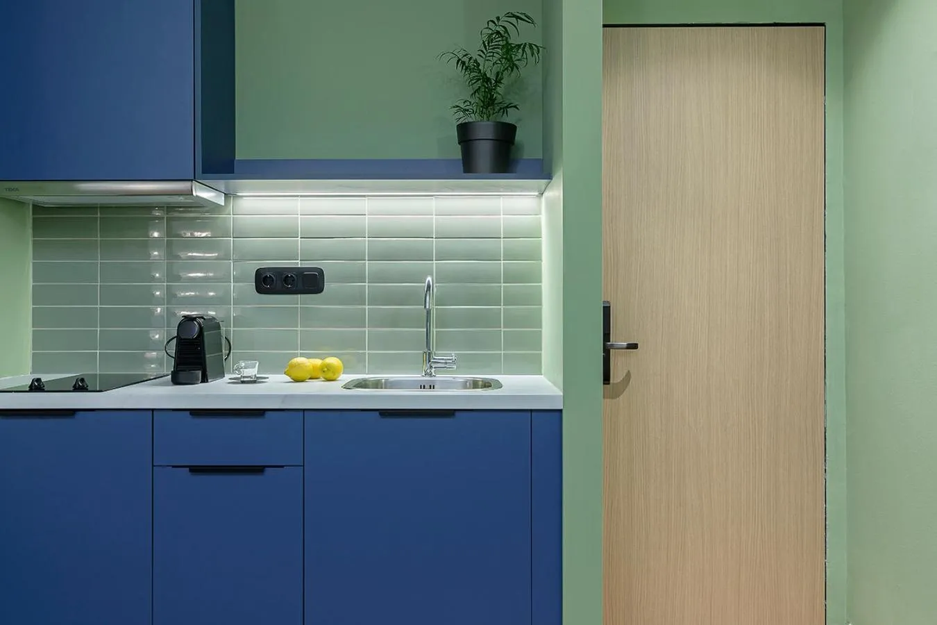 Kitchen or kitchenette in Acro Urban Suites
